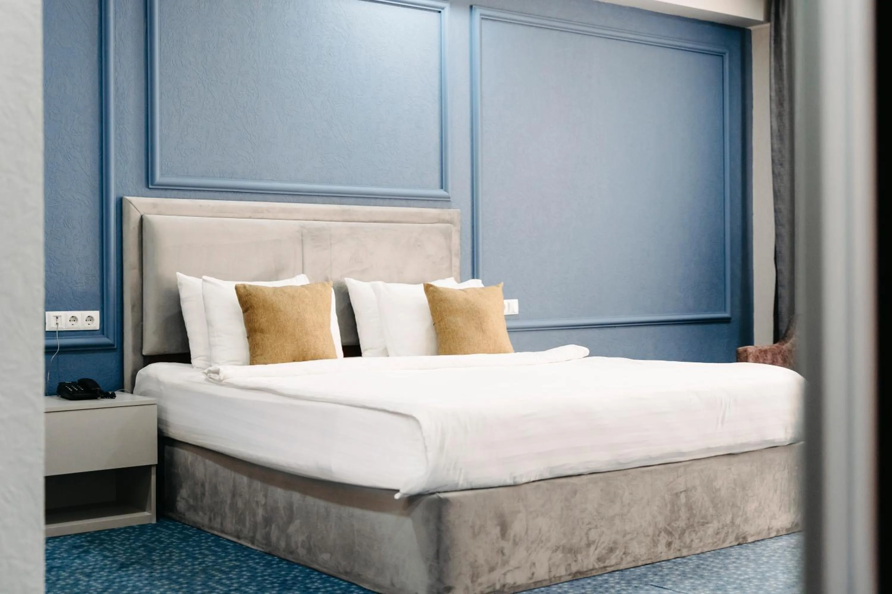 Bed in Grand Hotel Baku Central Park