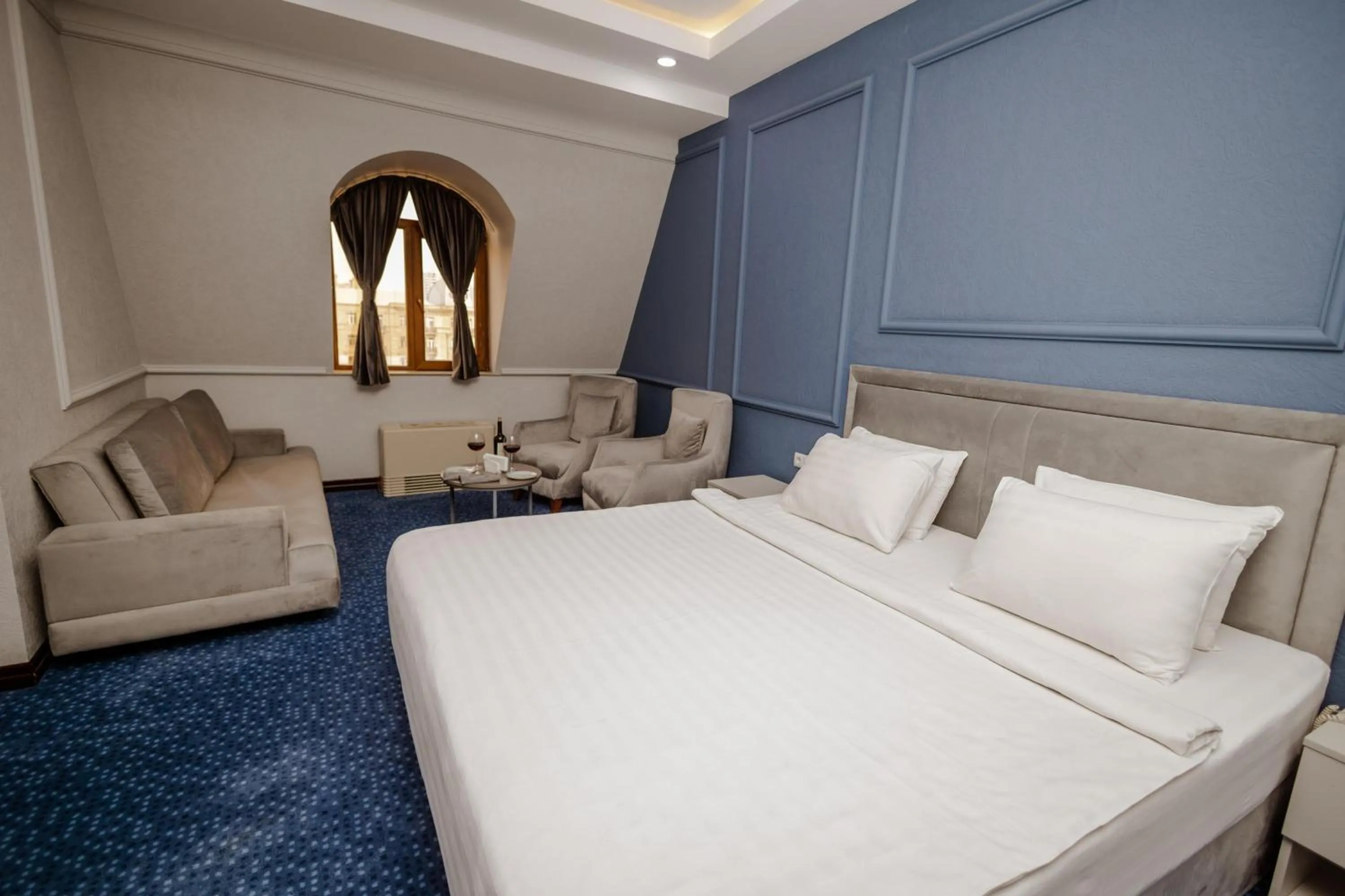 Property building, Bed in Grand Hotel Baku Central Park
