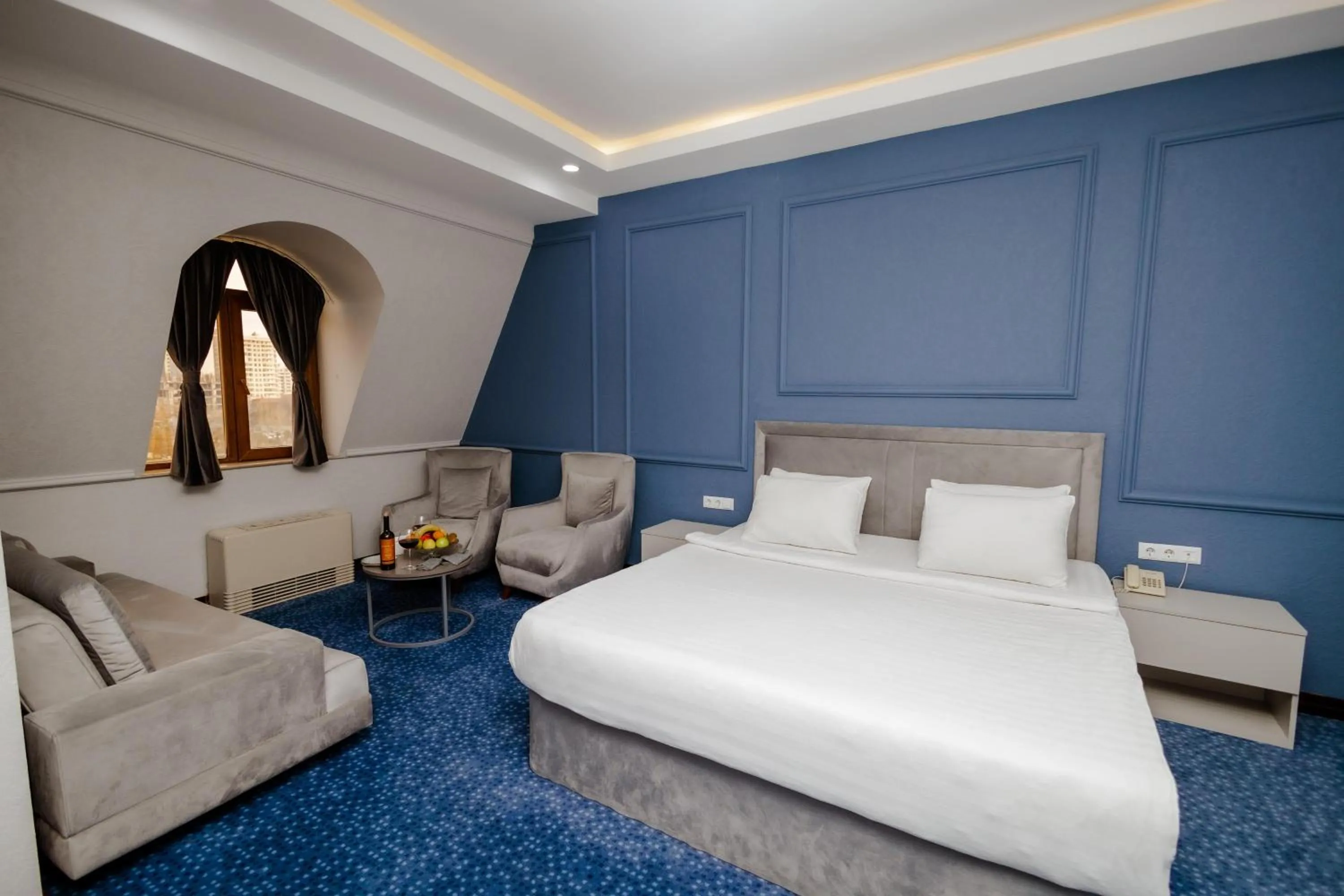 Property building, Bed in Grand Hotel Baku Central Park