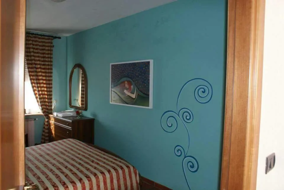 Photo of the whole room, Bed in Ristorante Albergo 'l Bunet