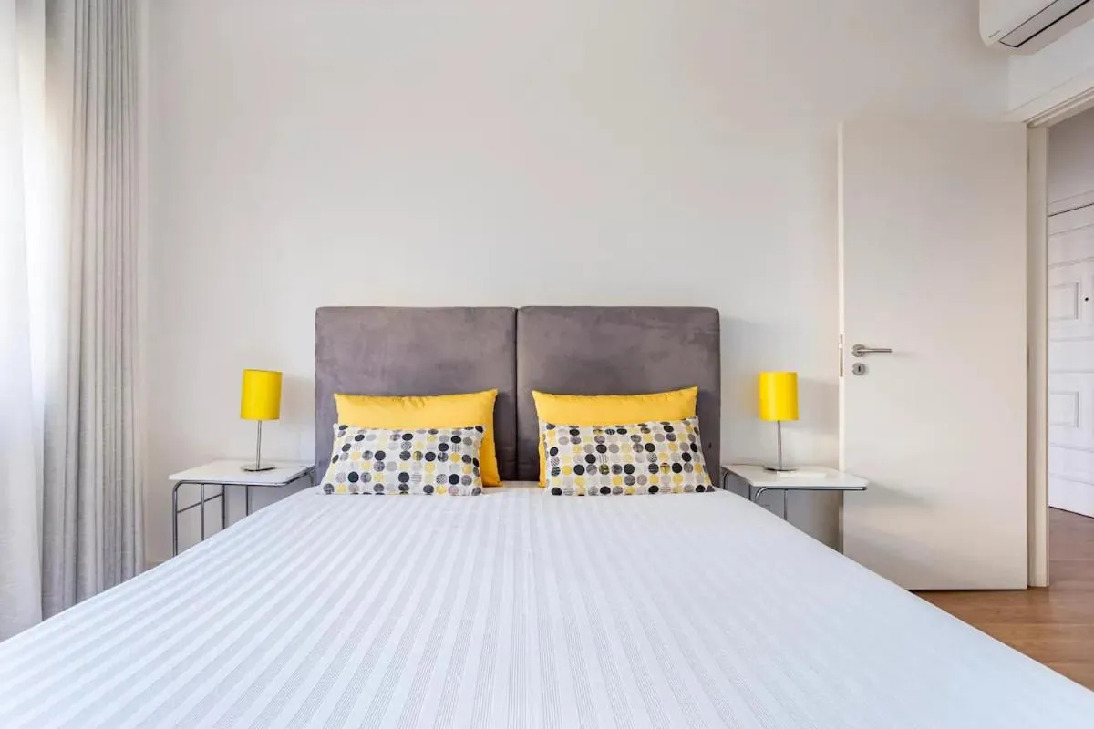 Bed in Luxury Anibal Cunha Apartments