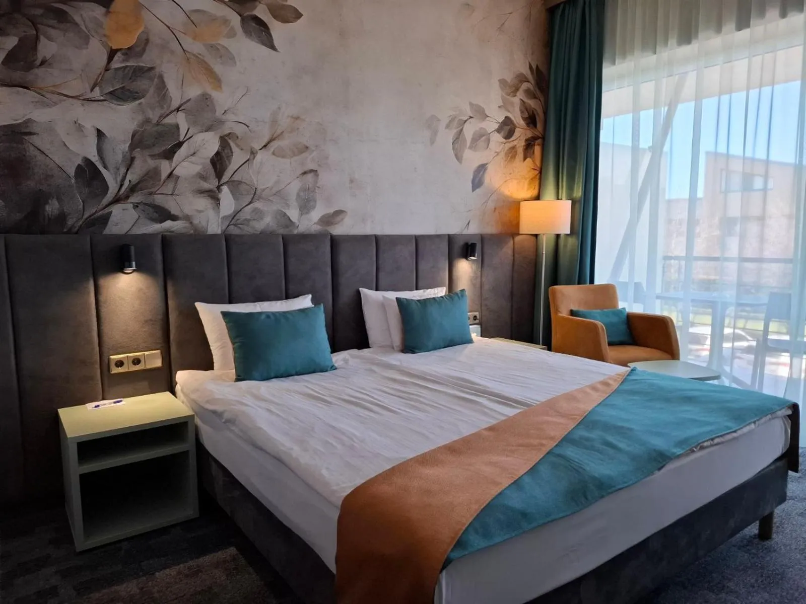 Bed in Szépia Bio and Art Hotel