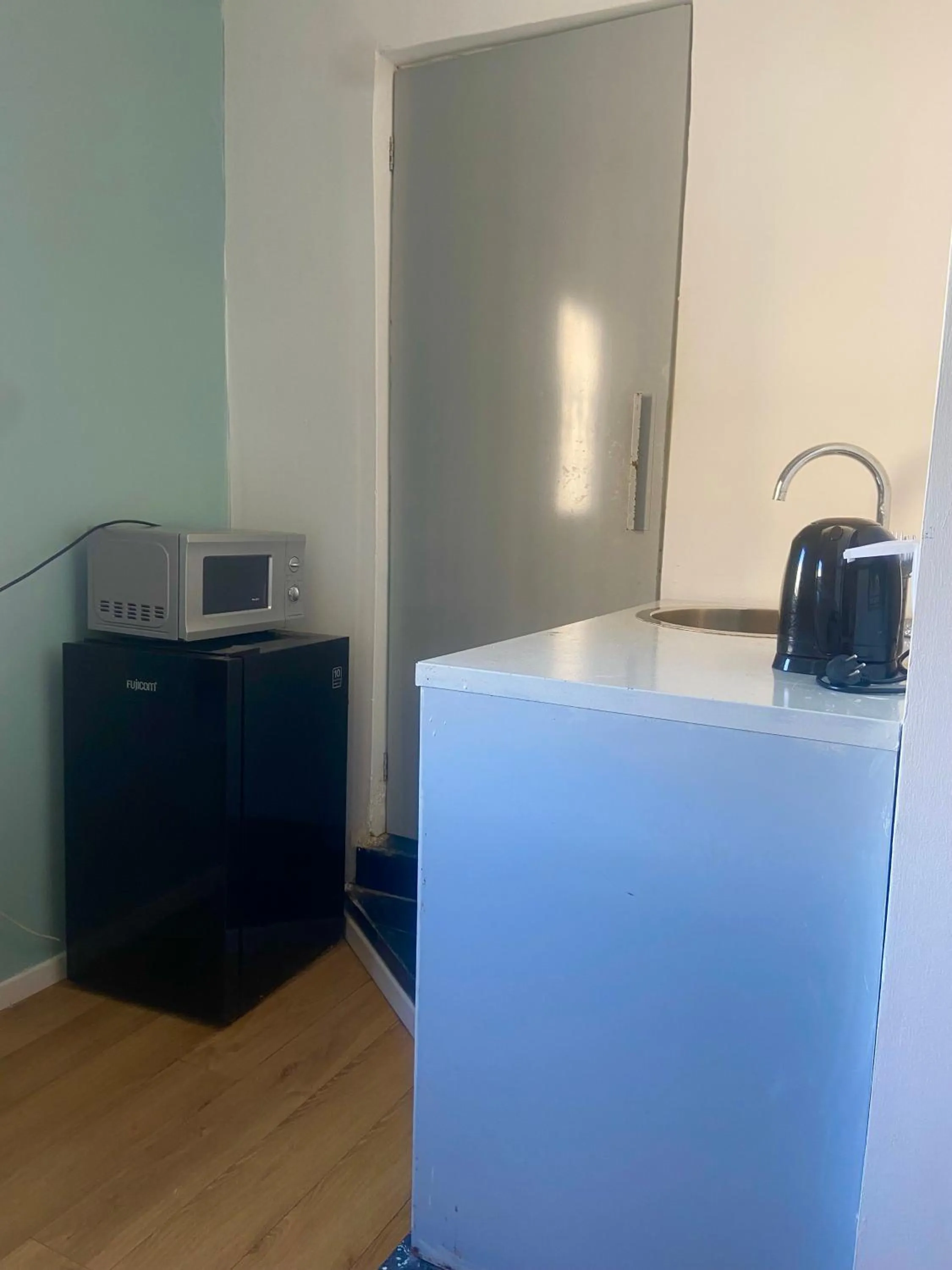 Kitchen or kitchenette in LEVO Urban Studios