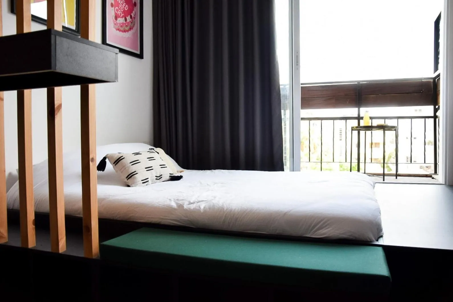 Photo of the whole room, Bed in LEVO Urban Studios