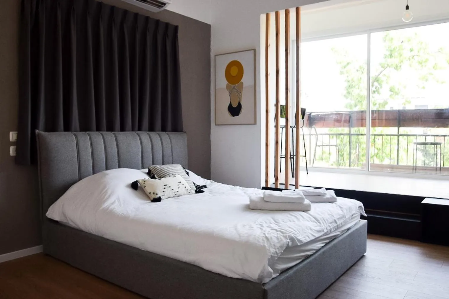 Photo of the whole room, Bed in LEVO Urban Studios