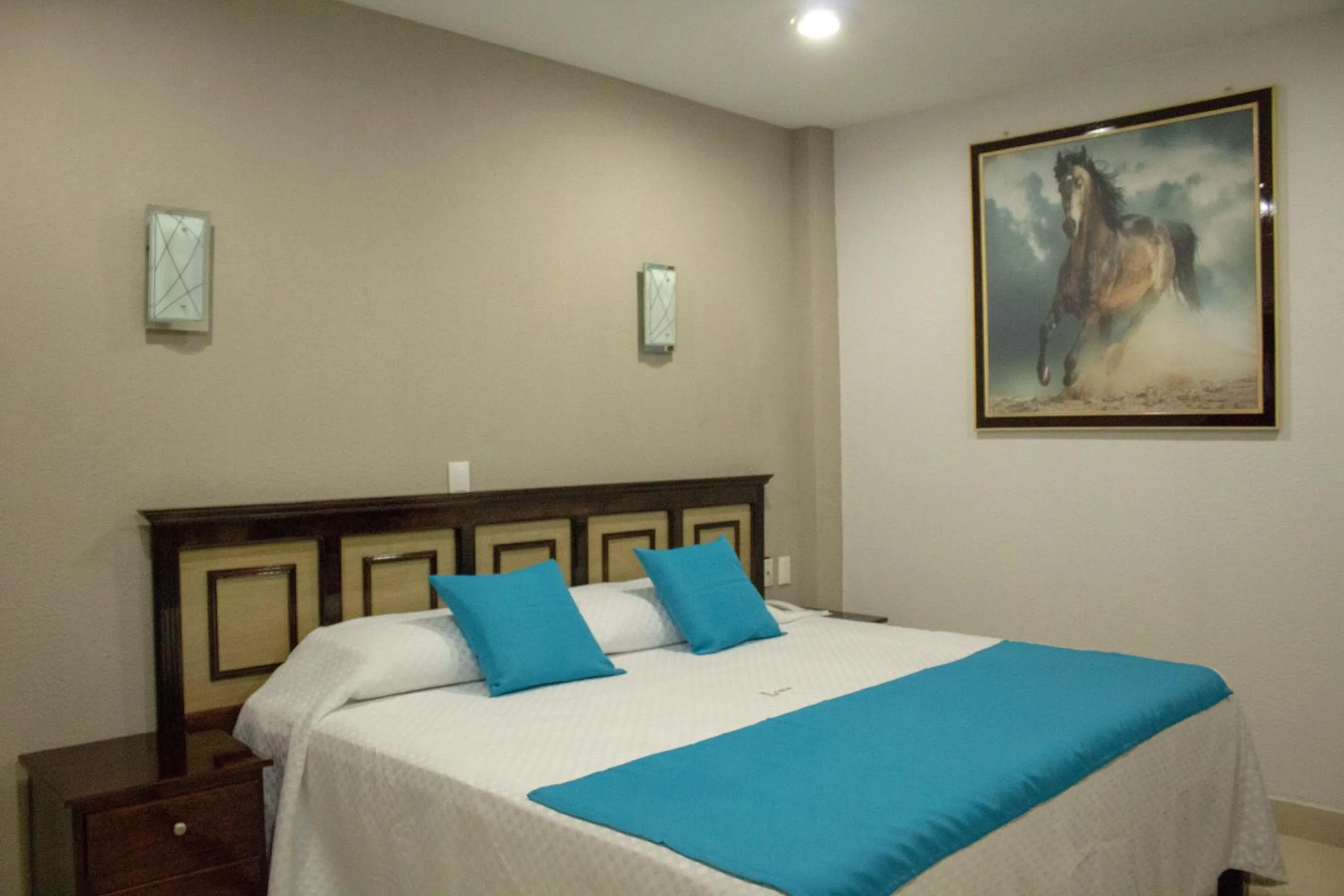 Bed in HOTEL DE LA PEÑA INN