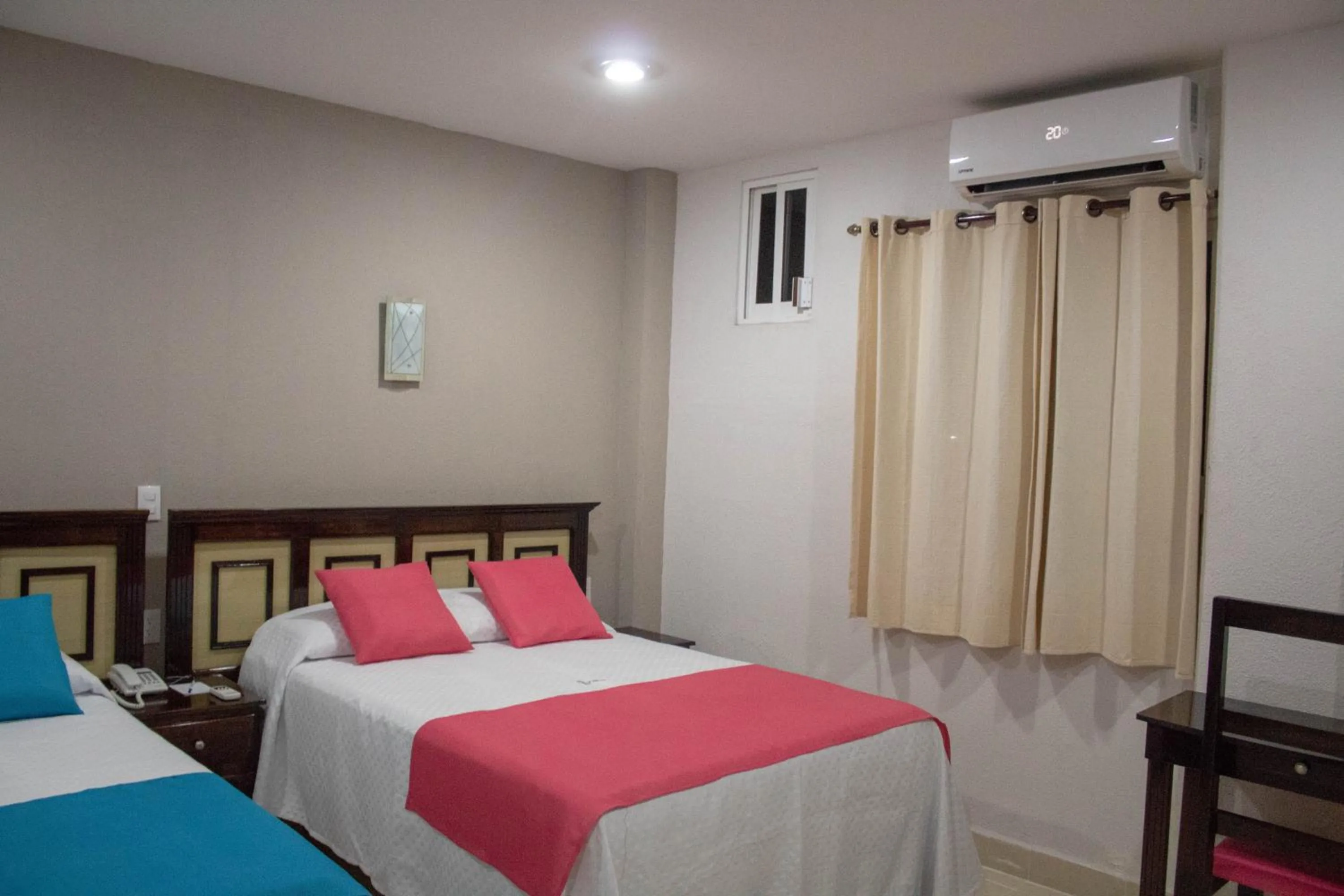 Bed in HOTEL DE LA PEÑA INN