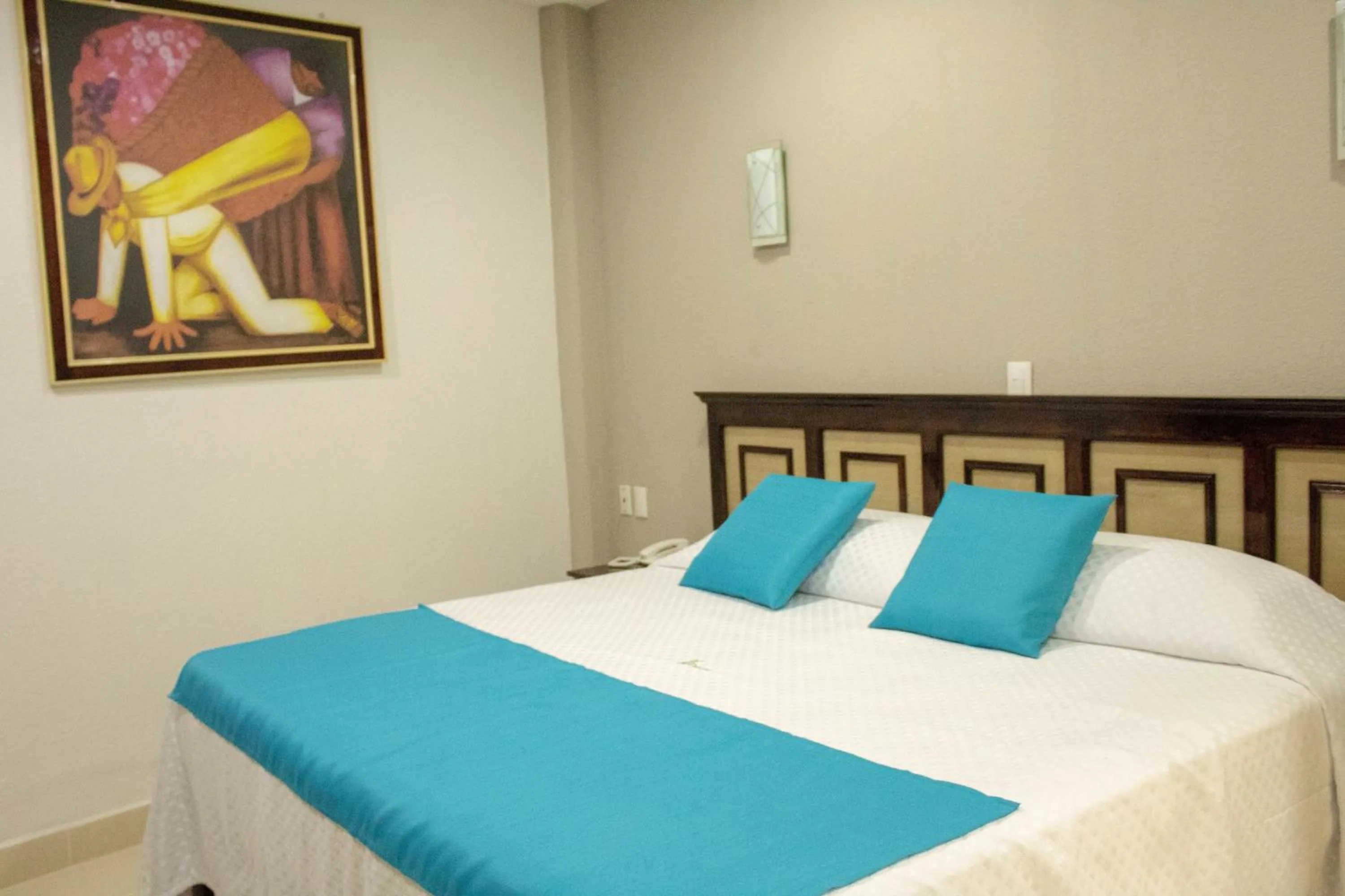 Bed in HOTEL DE LA PEÑA INN