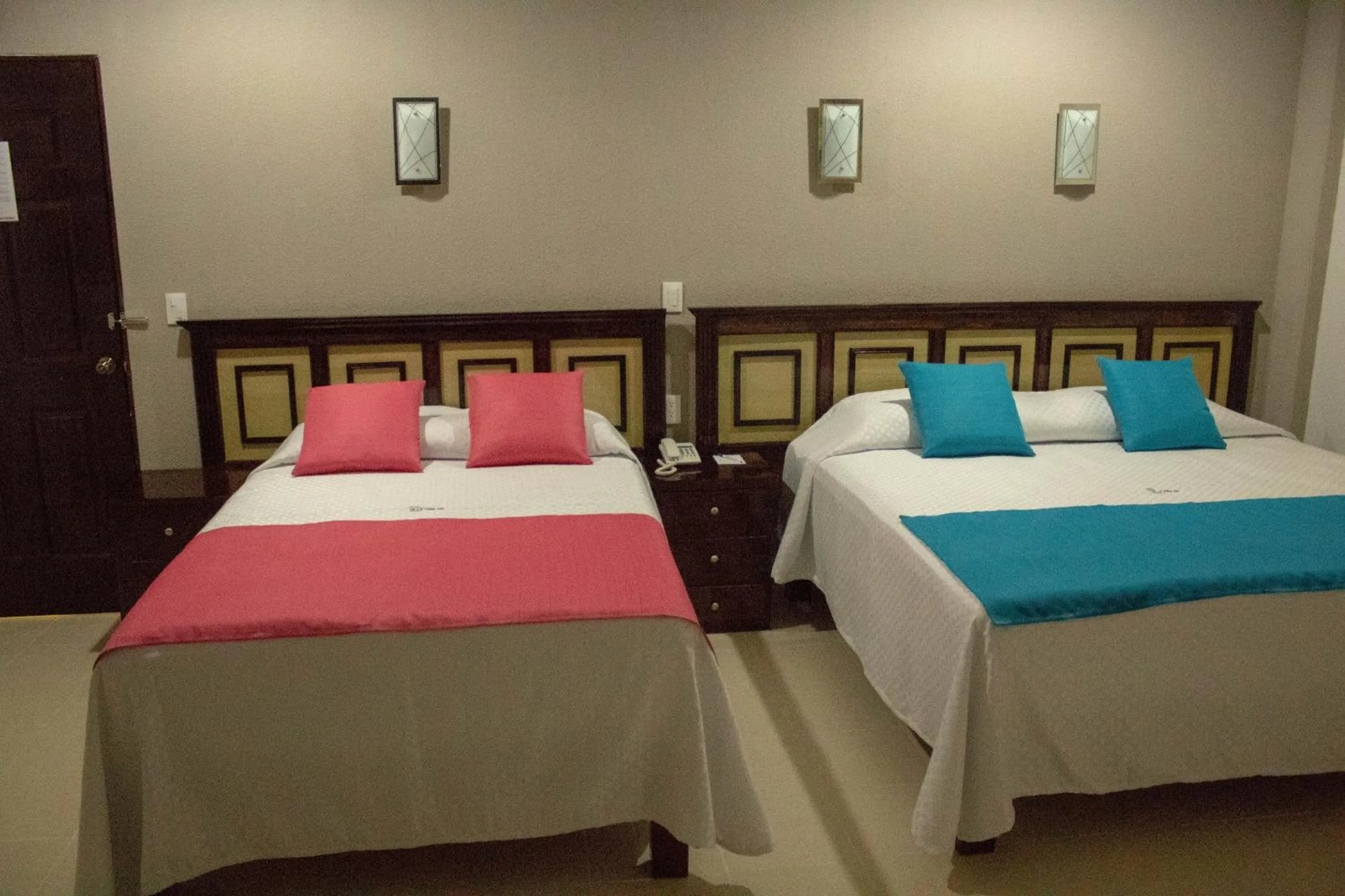 Bed in HOTEL DE LA PEÑA INN