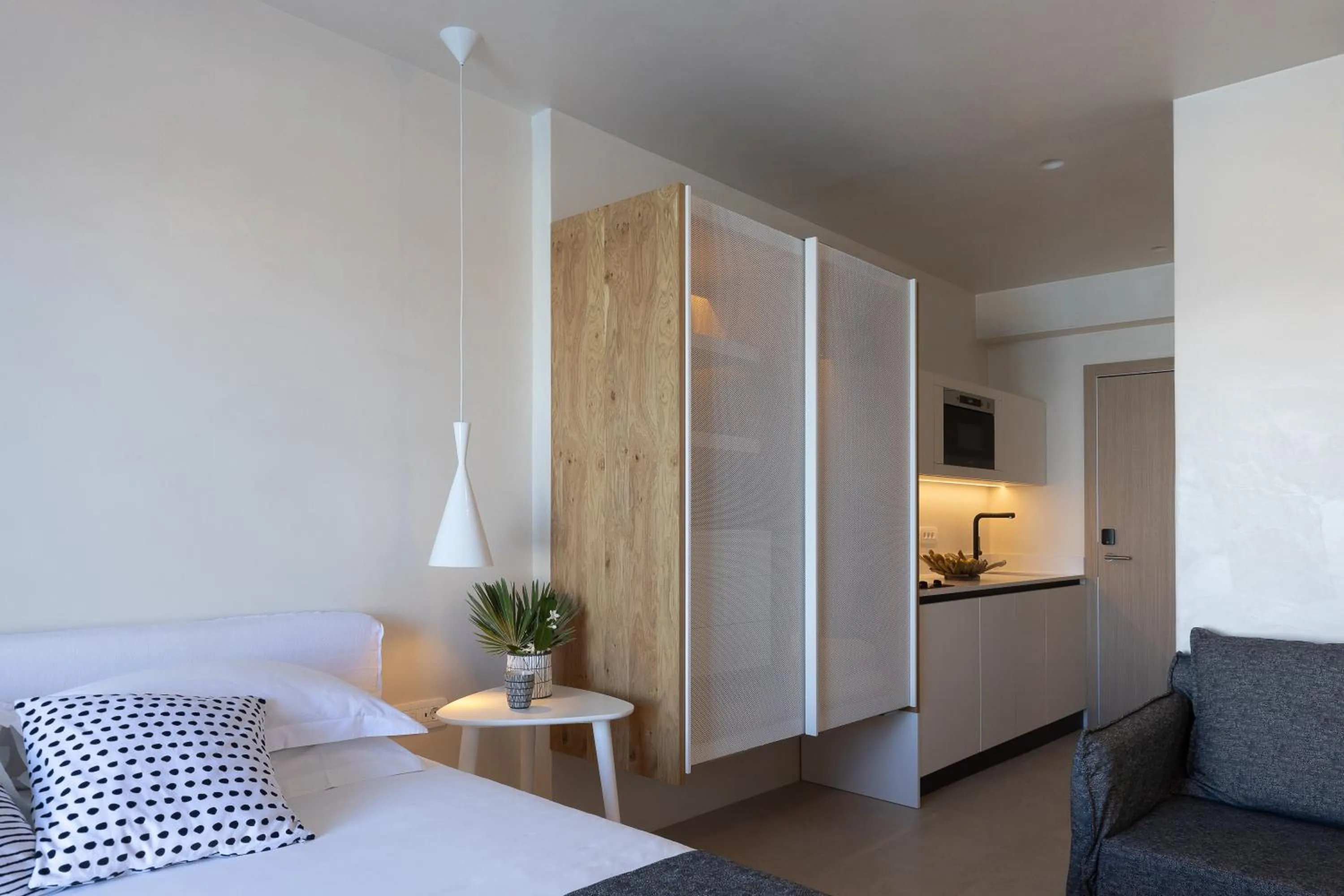 Bed in Akrogiali Beach Hotel Apartments