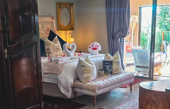 Bed in Cavalo Guesthouse & Equestrian Estate