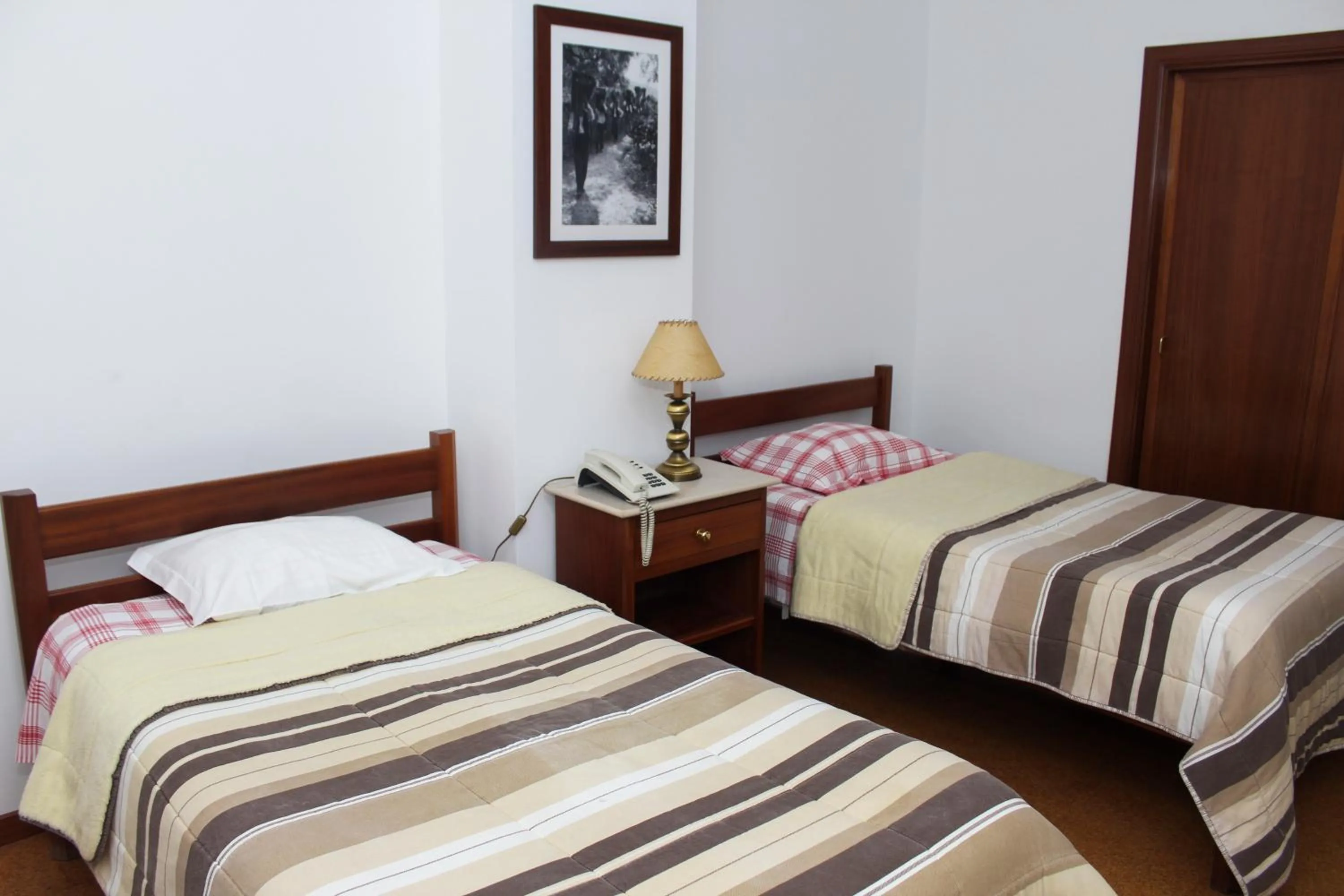 Bed in Hotel Oasis