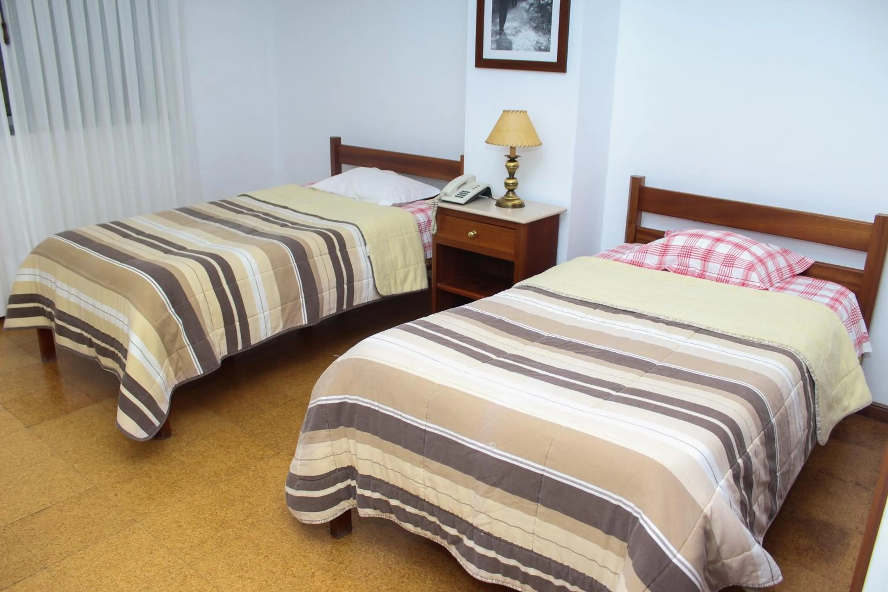 Bed in Hotel Oasis