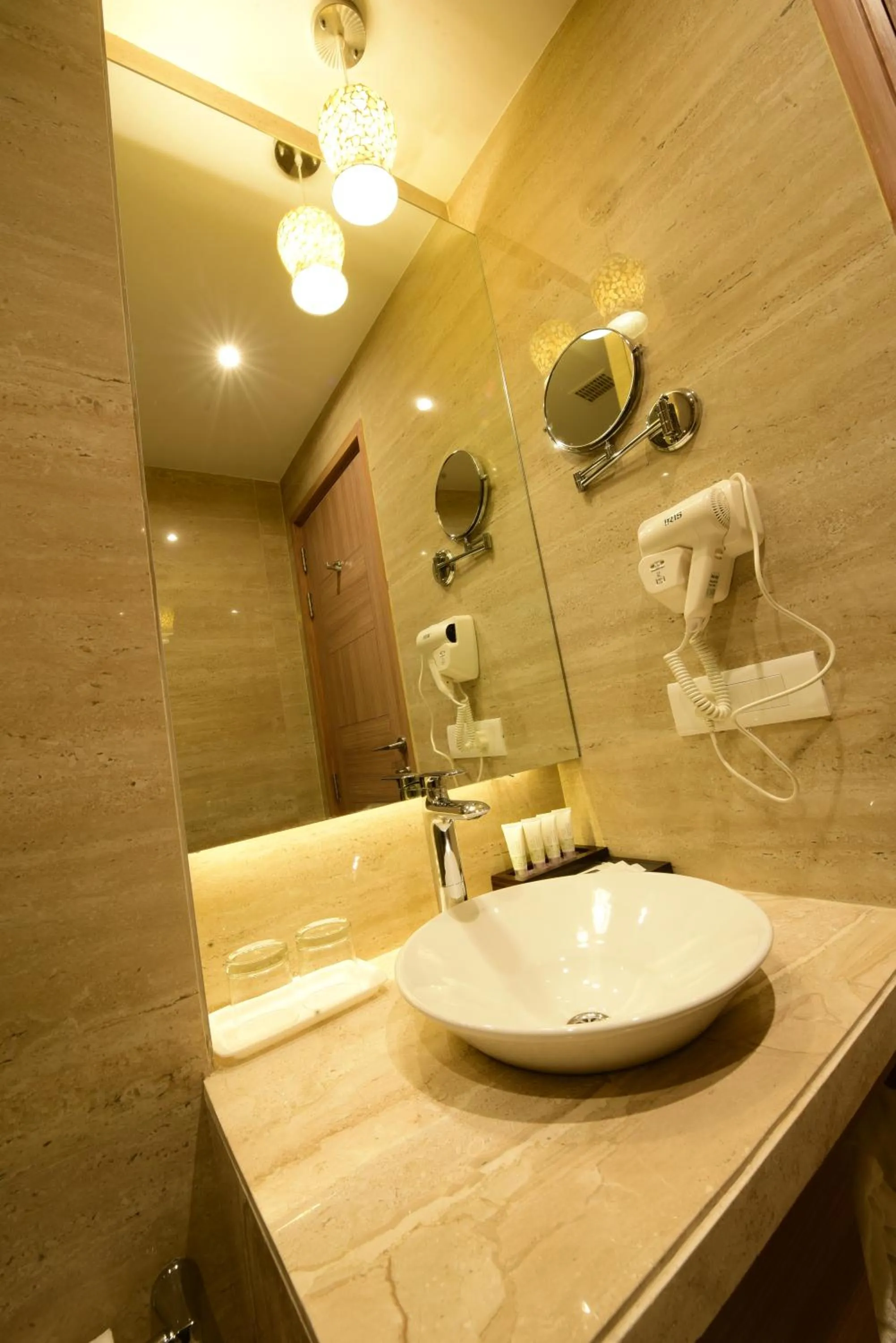 Bathroom in SureStay Plus by Best Western Amritsar