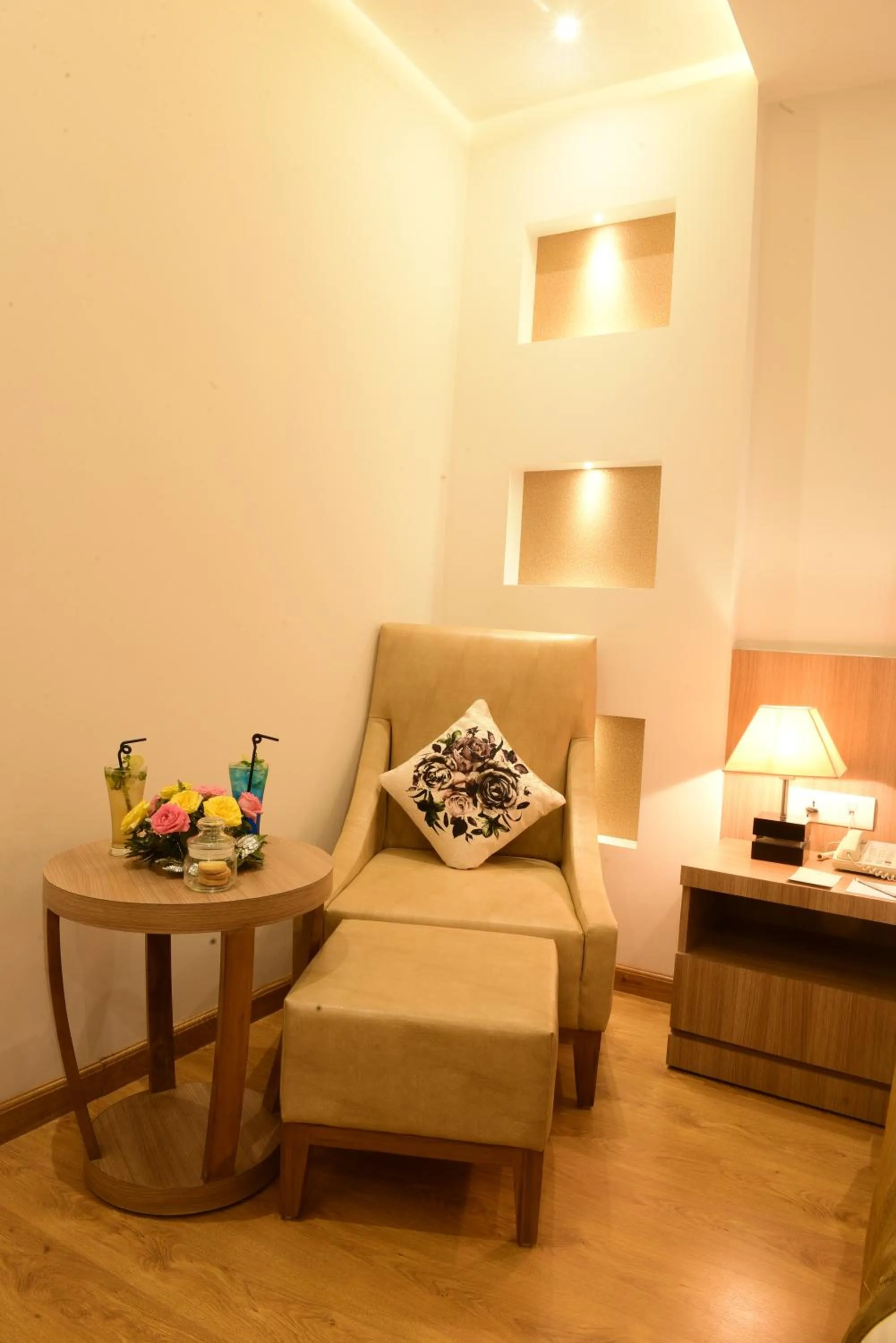 Seating area in SureStay Plus by Best Western Amritsar