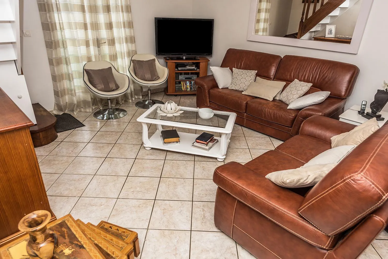 Communal lounge/ TV room in Chambres d'hôtes près de Disney