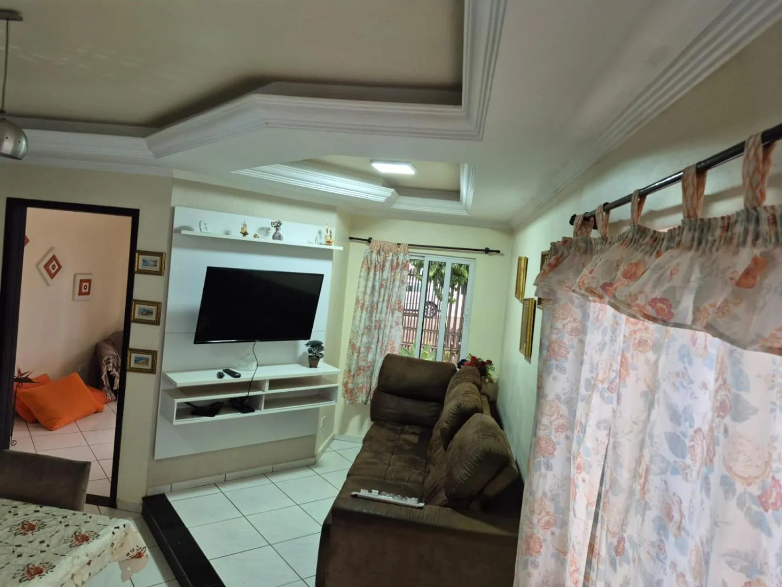 Communal lounge/ TV room in Casa Aconchegante no Centro de Foz do Iguaçu