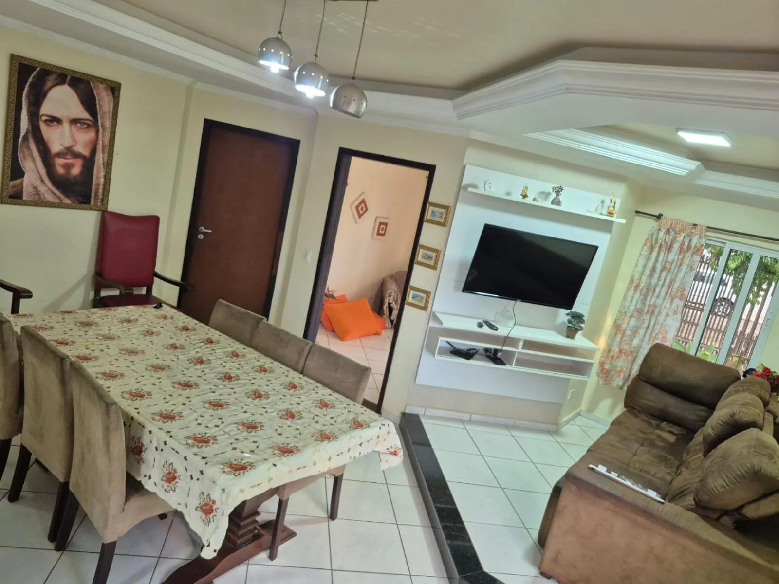 Communal lounge/ TV room in Casa Aconchegante no Centro de Foz do Iguaçu