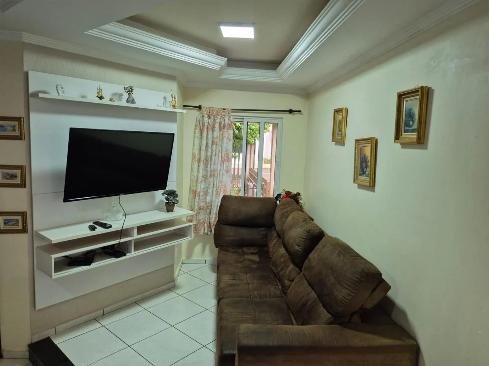 Communal lounge/ TV room in Casa Aconchegante no Centro de Foz do Iguaçu