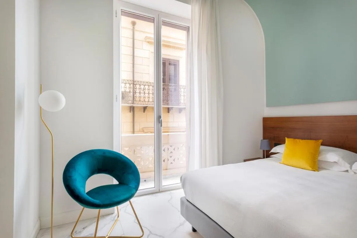 Bed in Palazzo Sovrana Serviced Luxury Apartments