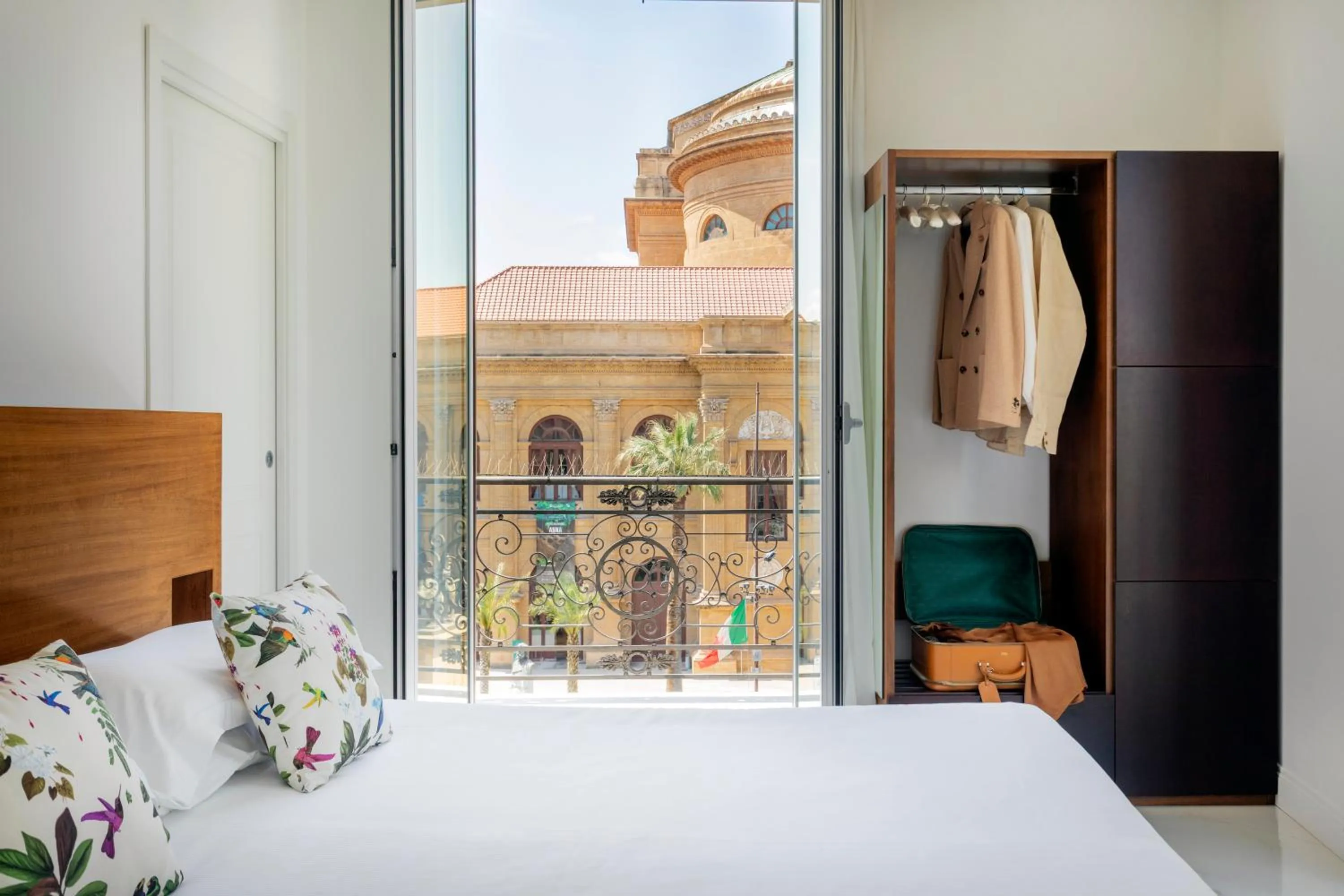 Bed in Palazzo Sovrana Serviced Luxury Apartments