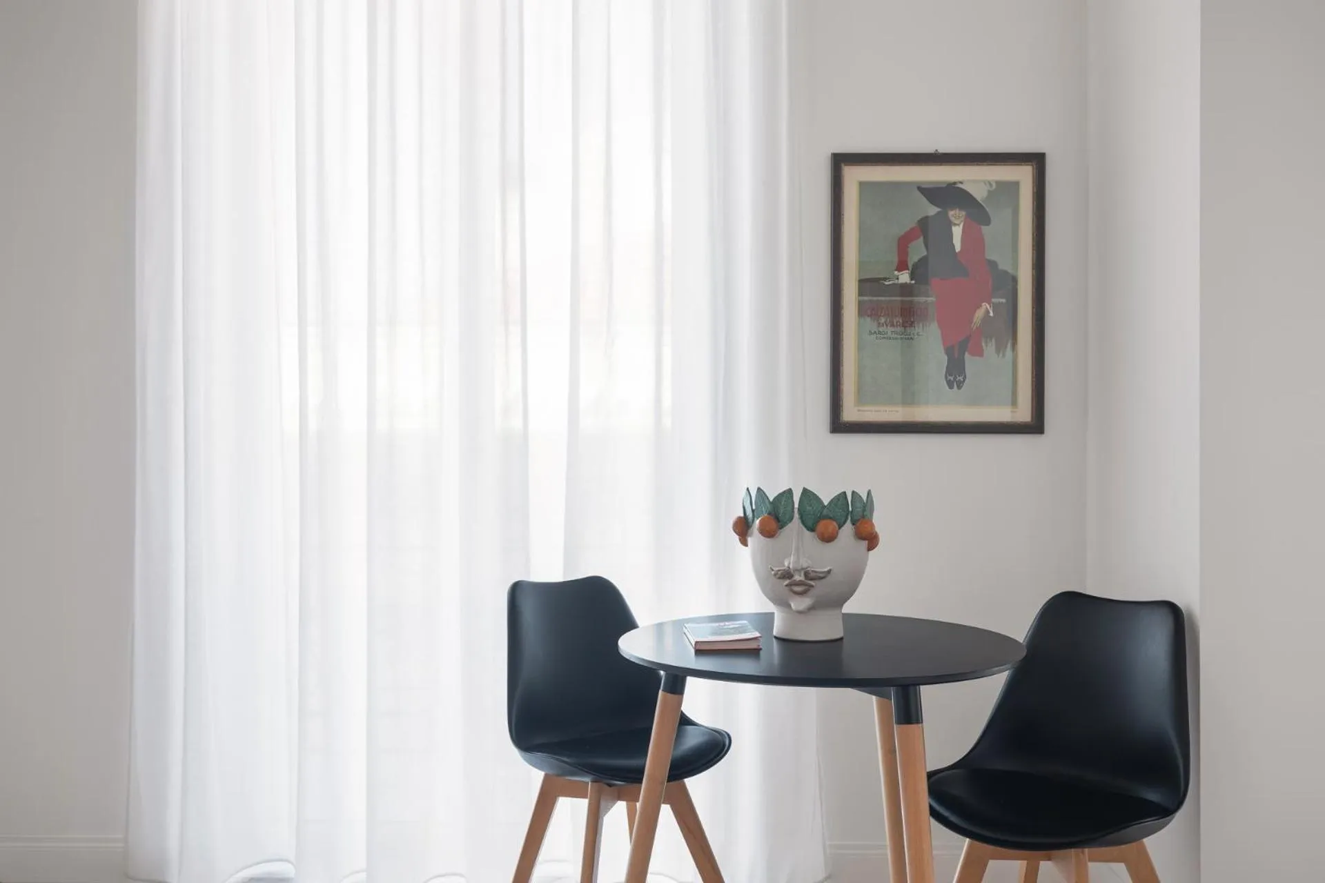 Dining area in Palazzo Sovrana Serviced Luxury Apartments