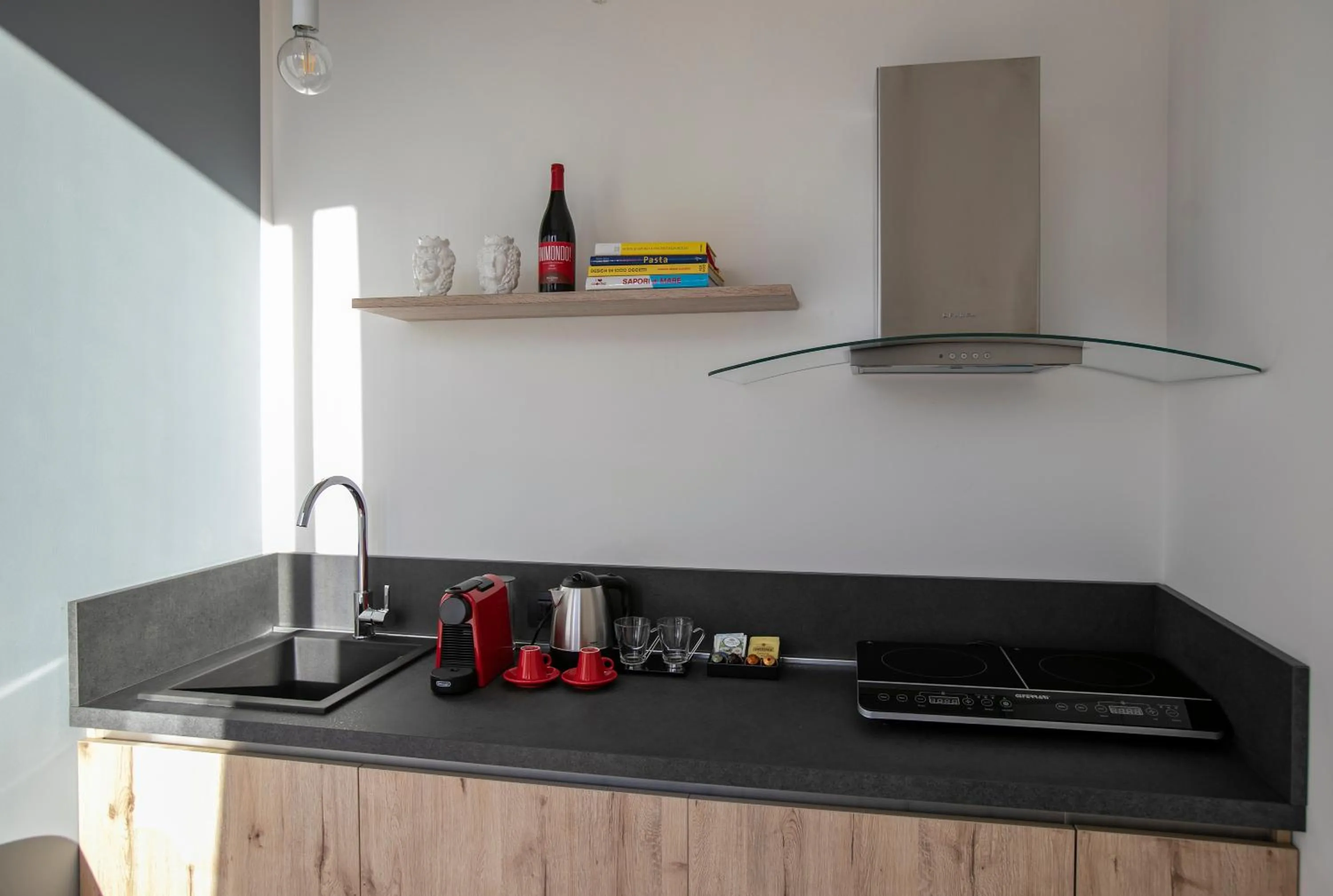 Kitchen or kitchenette in Palazzo Sovrana Serviced Luxury Apartments