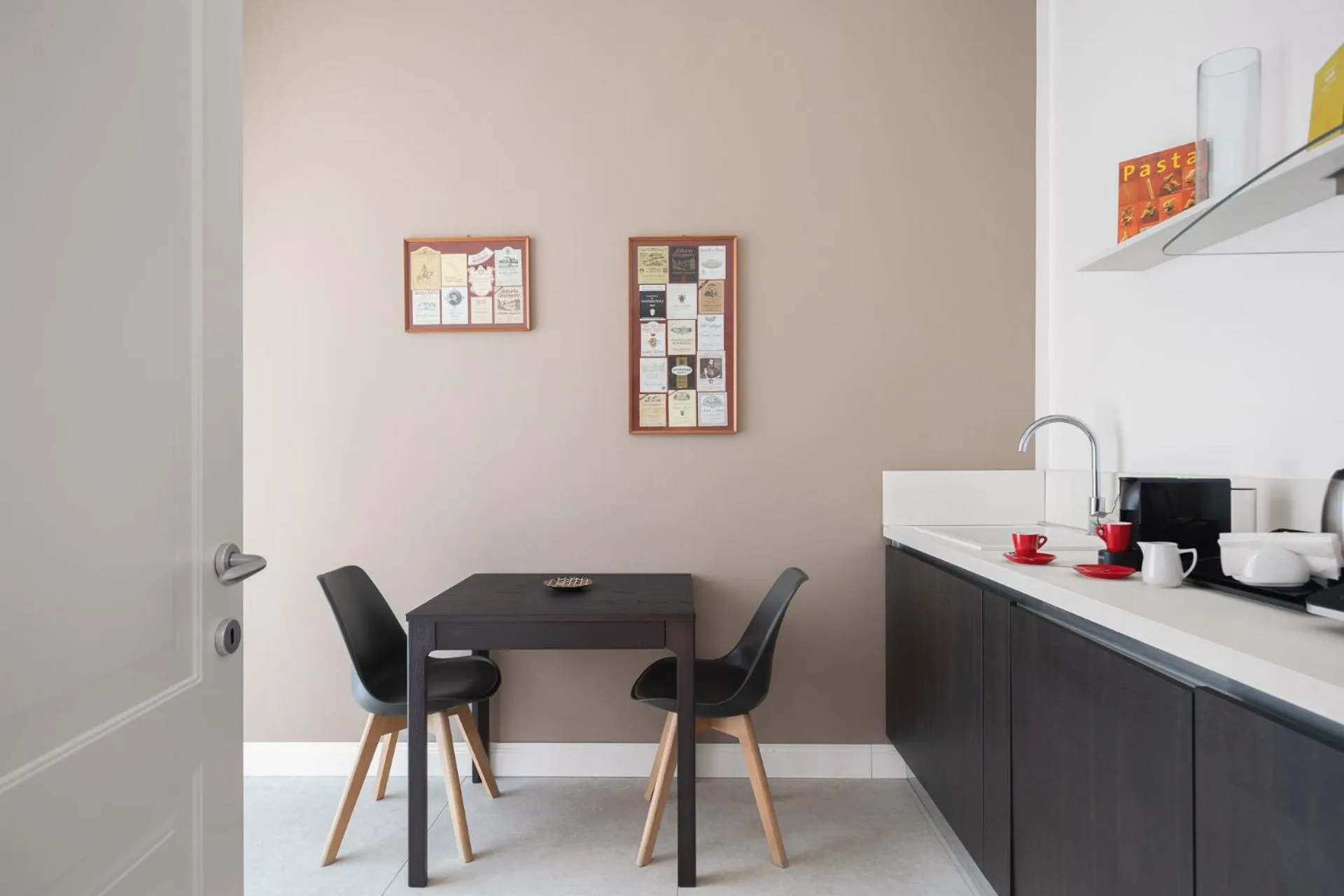 Dining area in Palazzo Sovrana Serviced Luxury Apartments