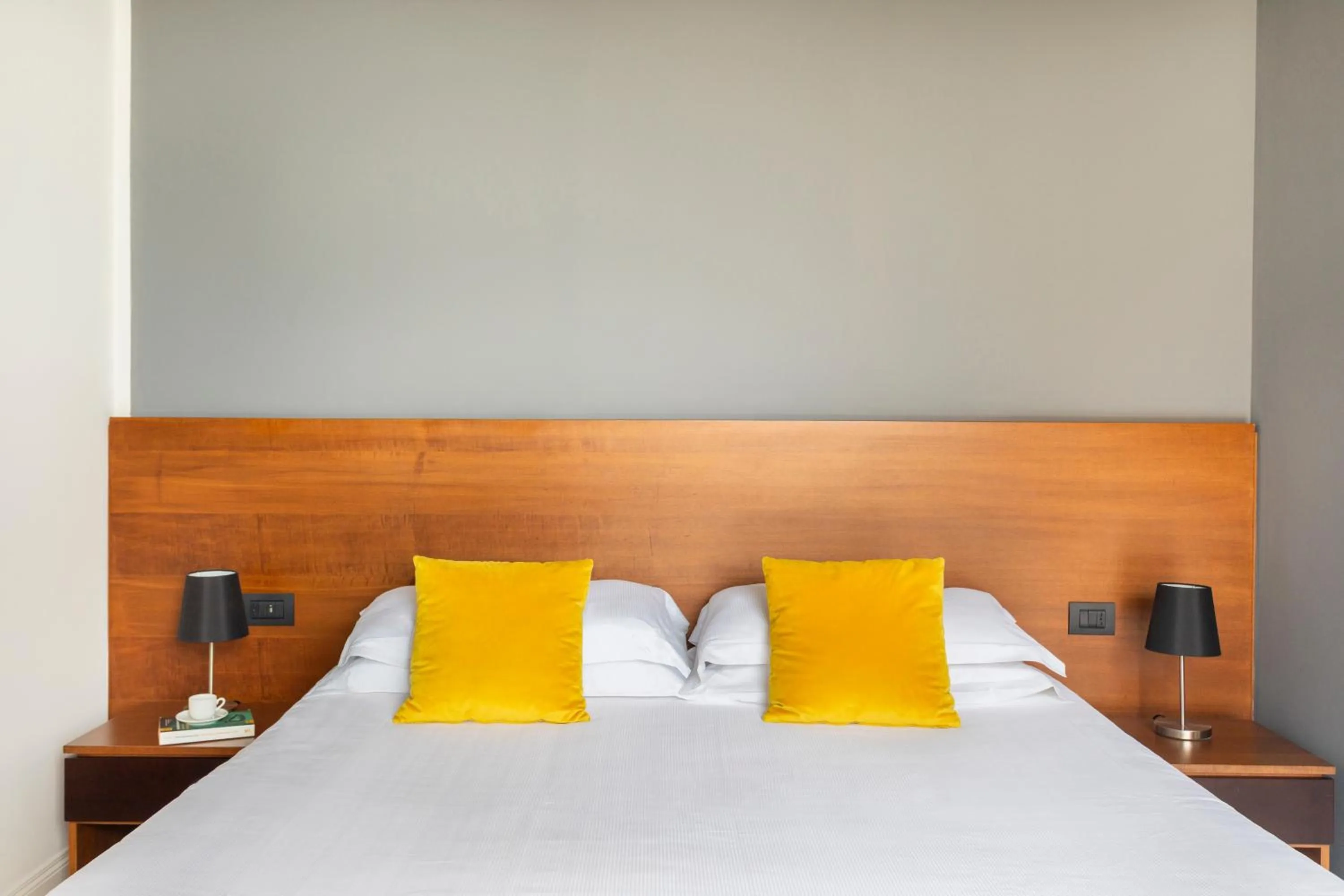 Bed in Palazzo Sovrana Serviced Luxury Apartments