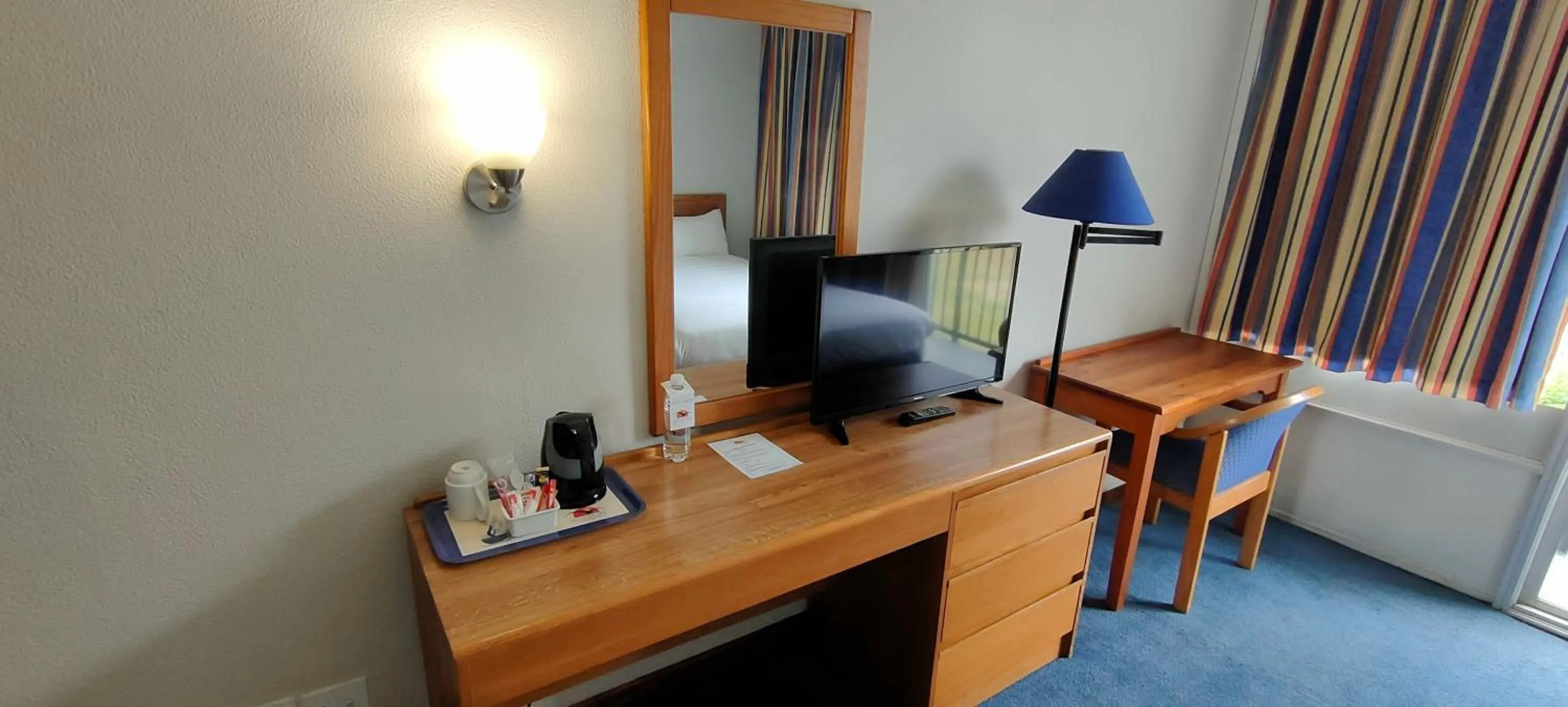 Bedroom in African Sky Newcastle Inn