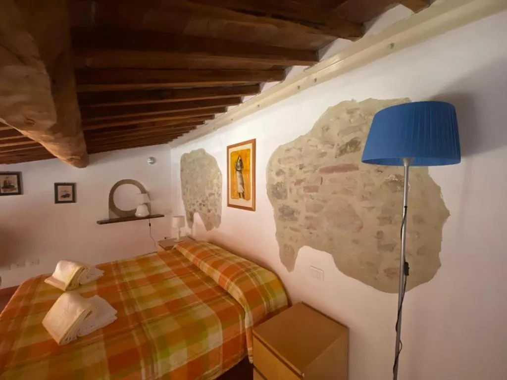 Bed in CasaLeTolfe Residence