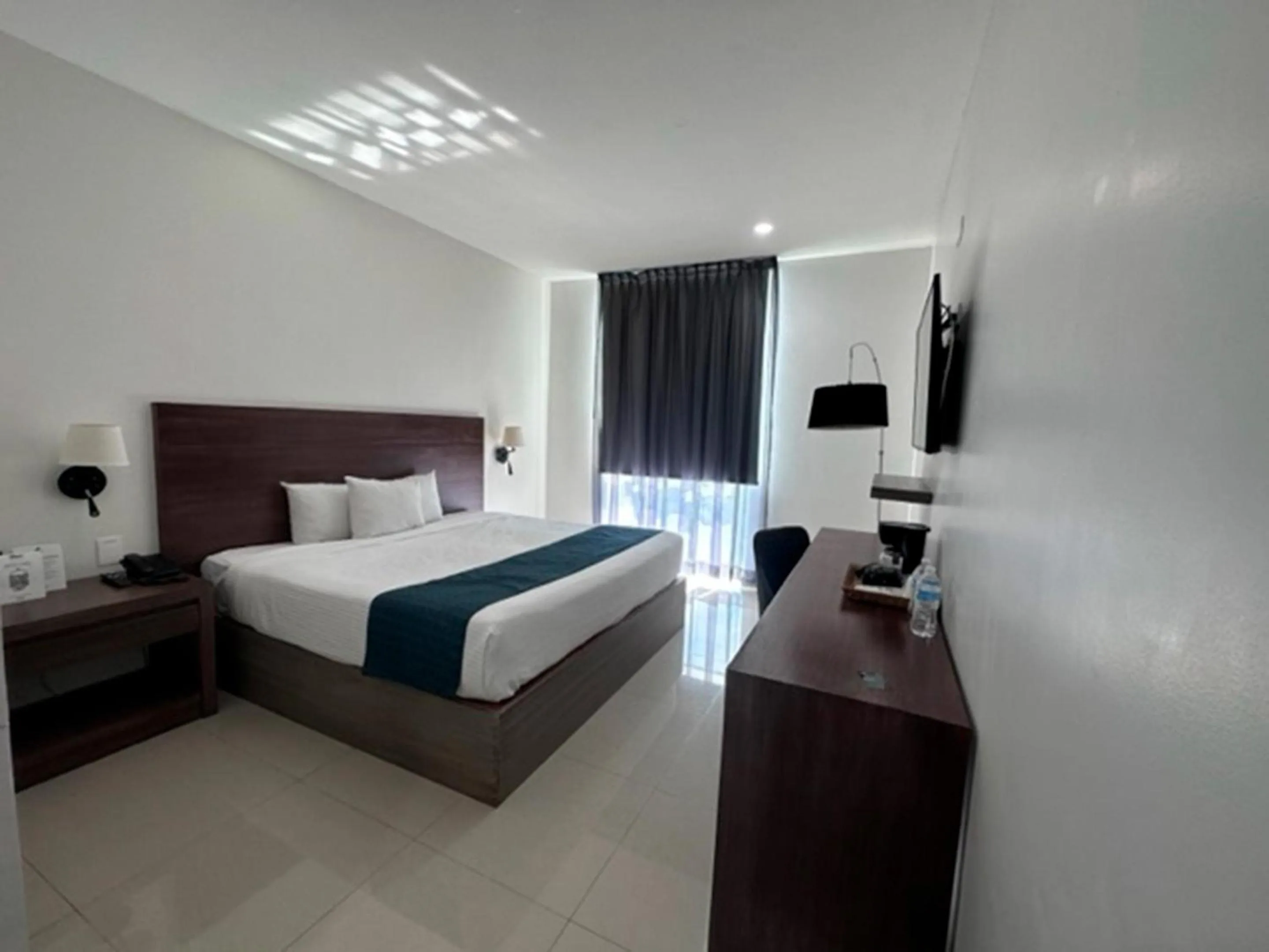 Bed in InHouse Hotel Culiacán