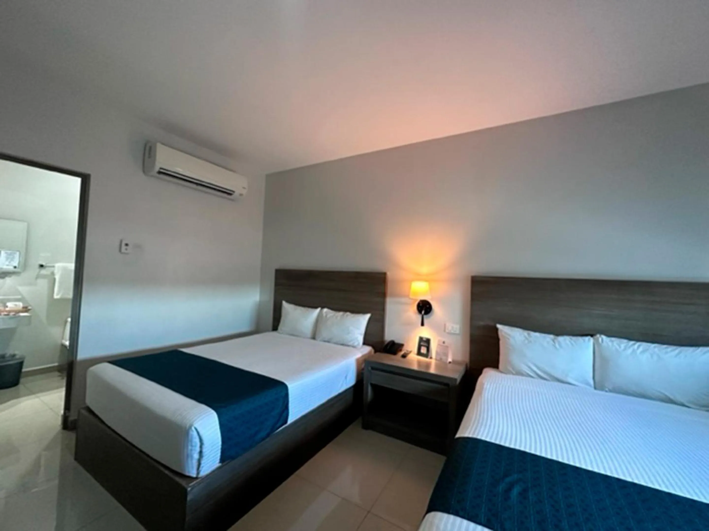 Bed in InHouse Hotel Culiacán