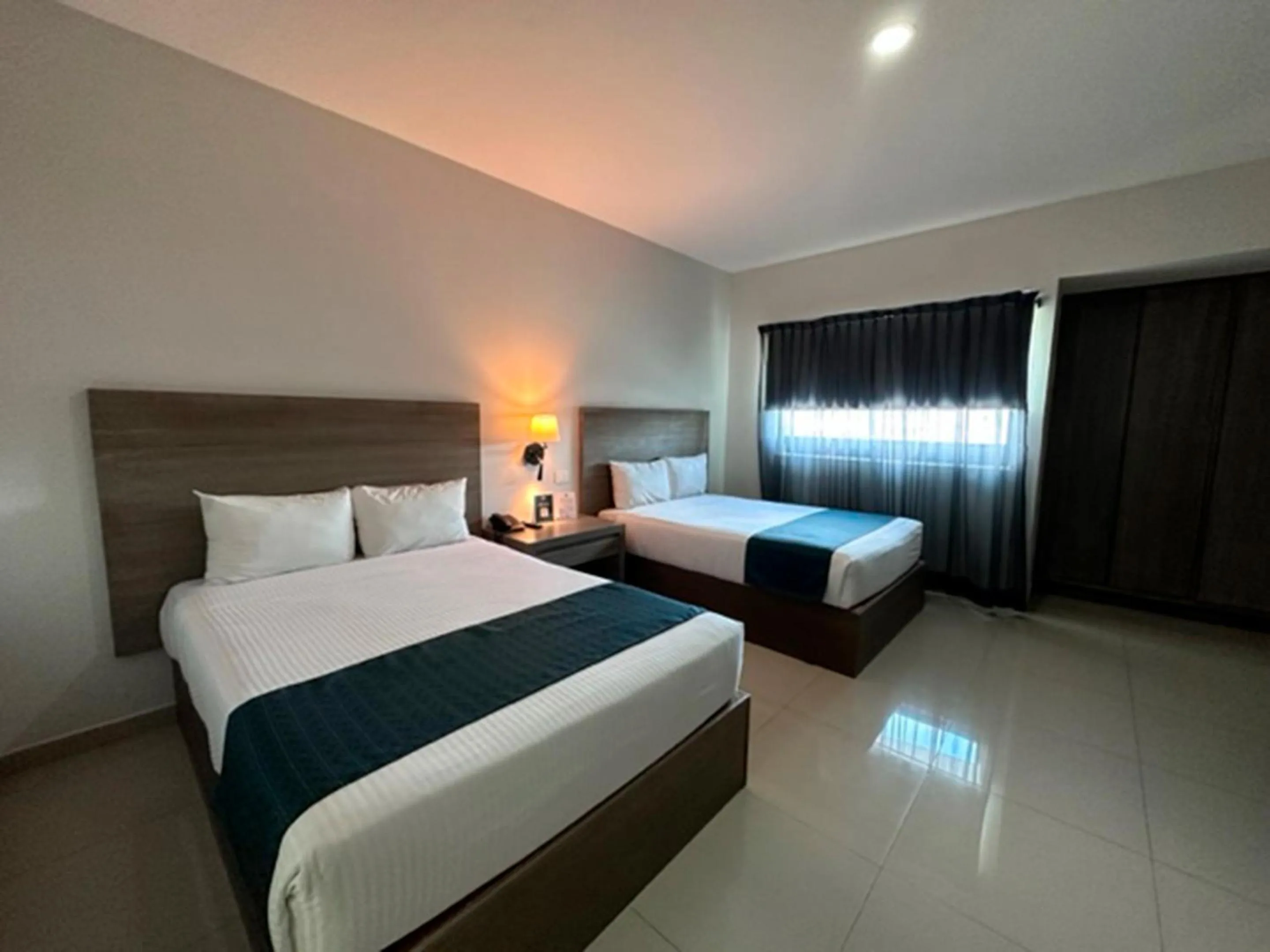 Bed in InHouse Hotel Culiacán