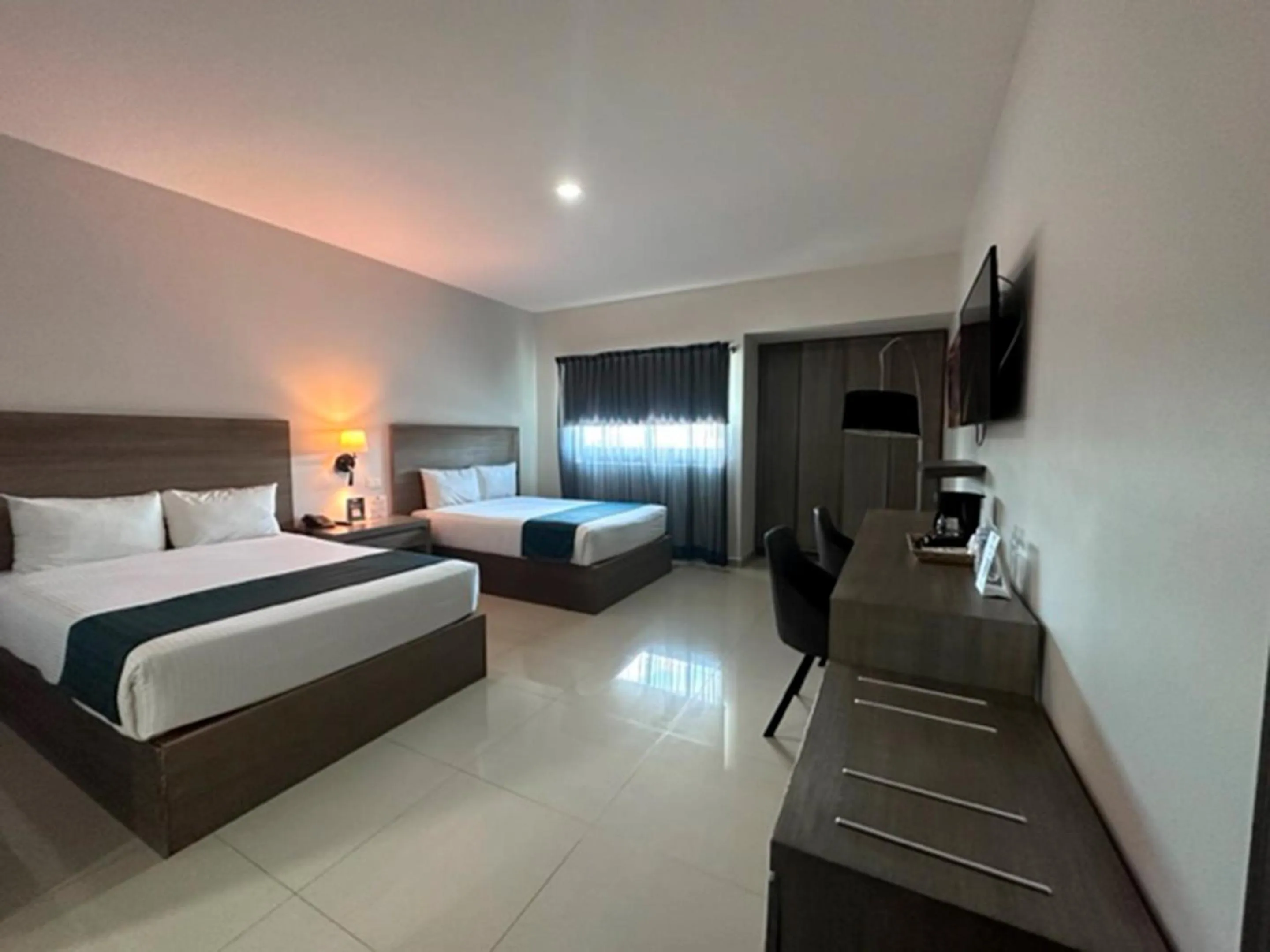 Bed in InHouse Hotel Culiacán