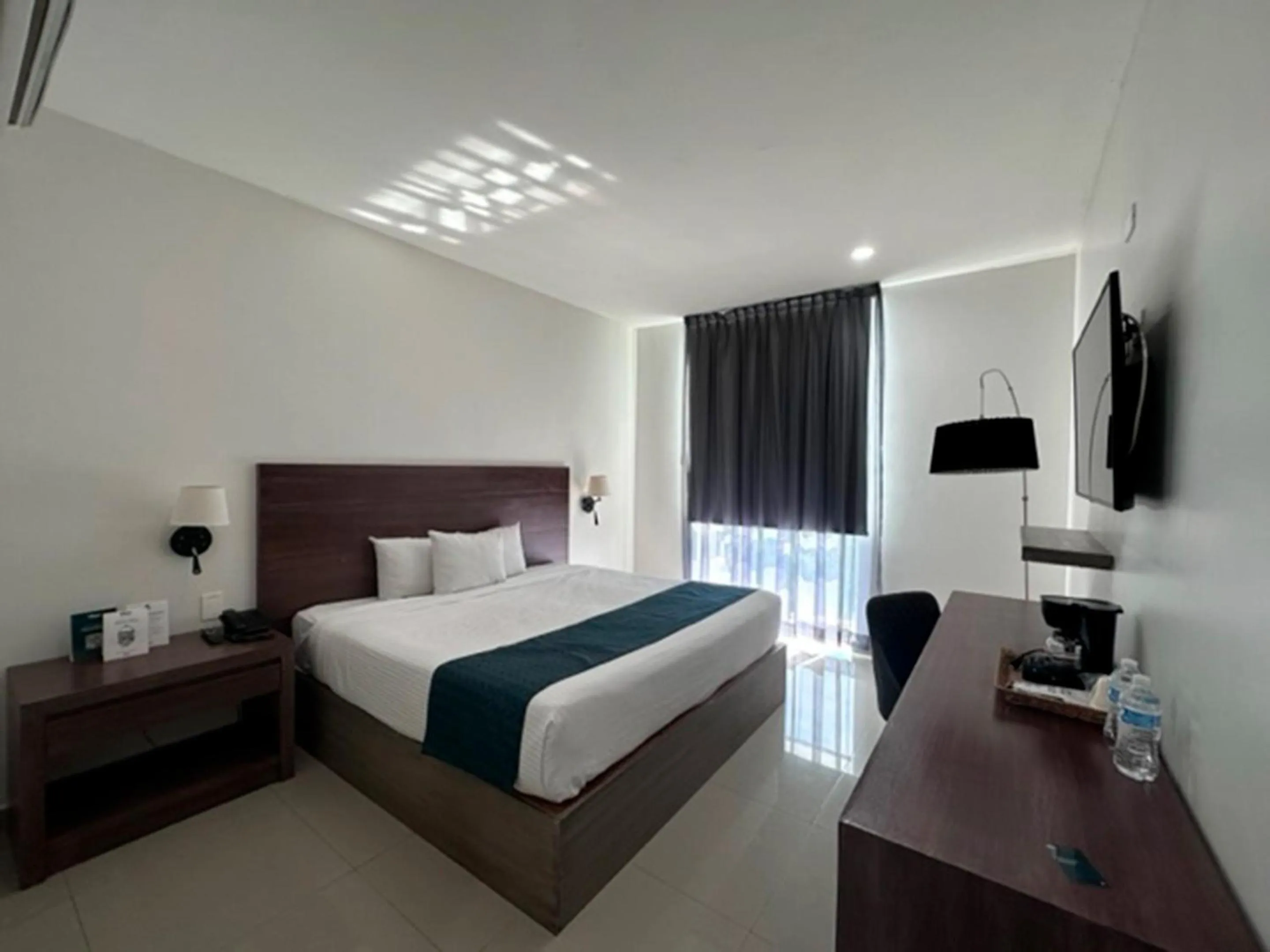 Bed in InHouse Hotel Culiacán