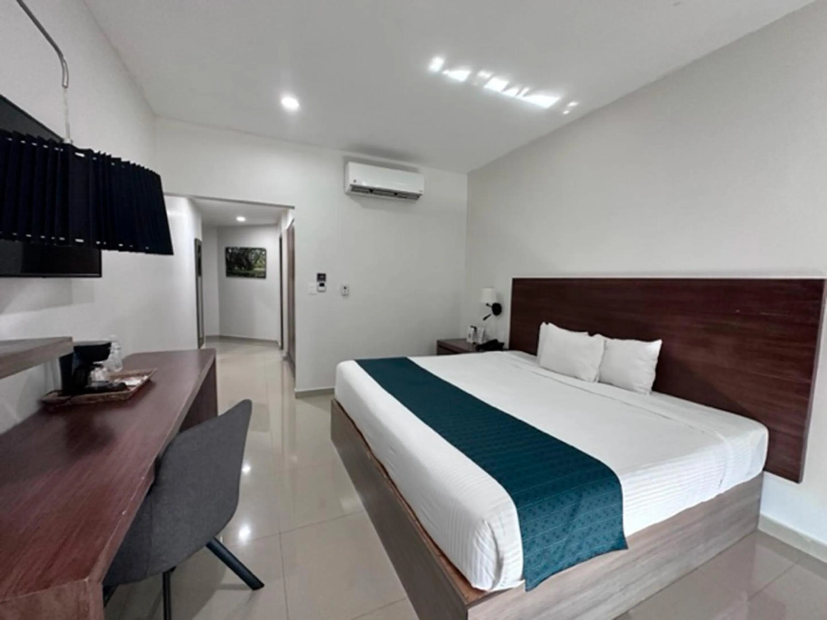 Bed in InHouse Hotel Culiacán