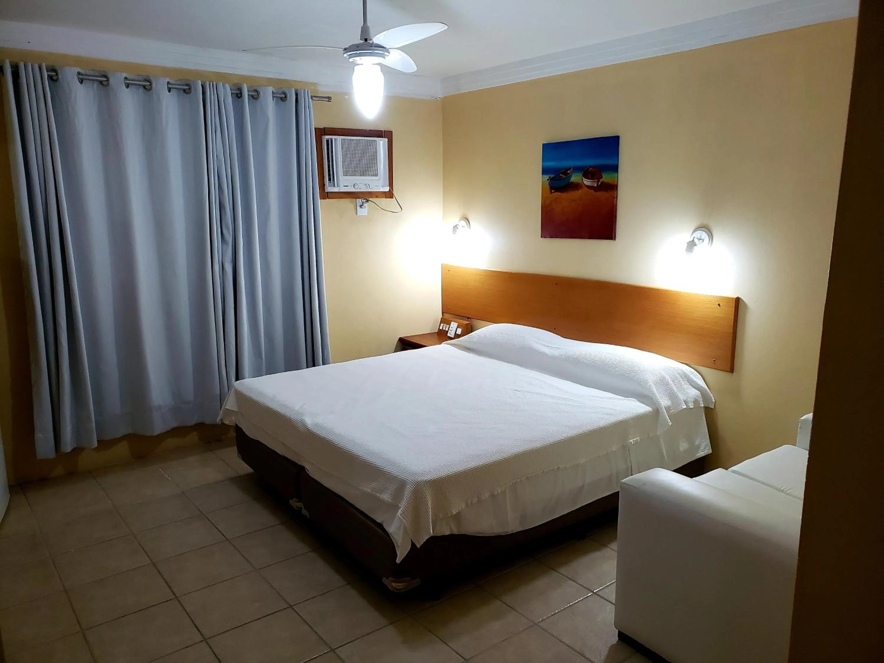 Bed in De Rose Praia Hotel