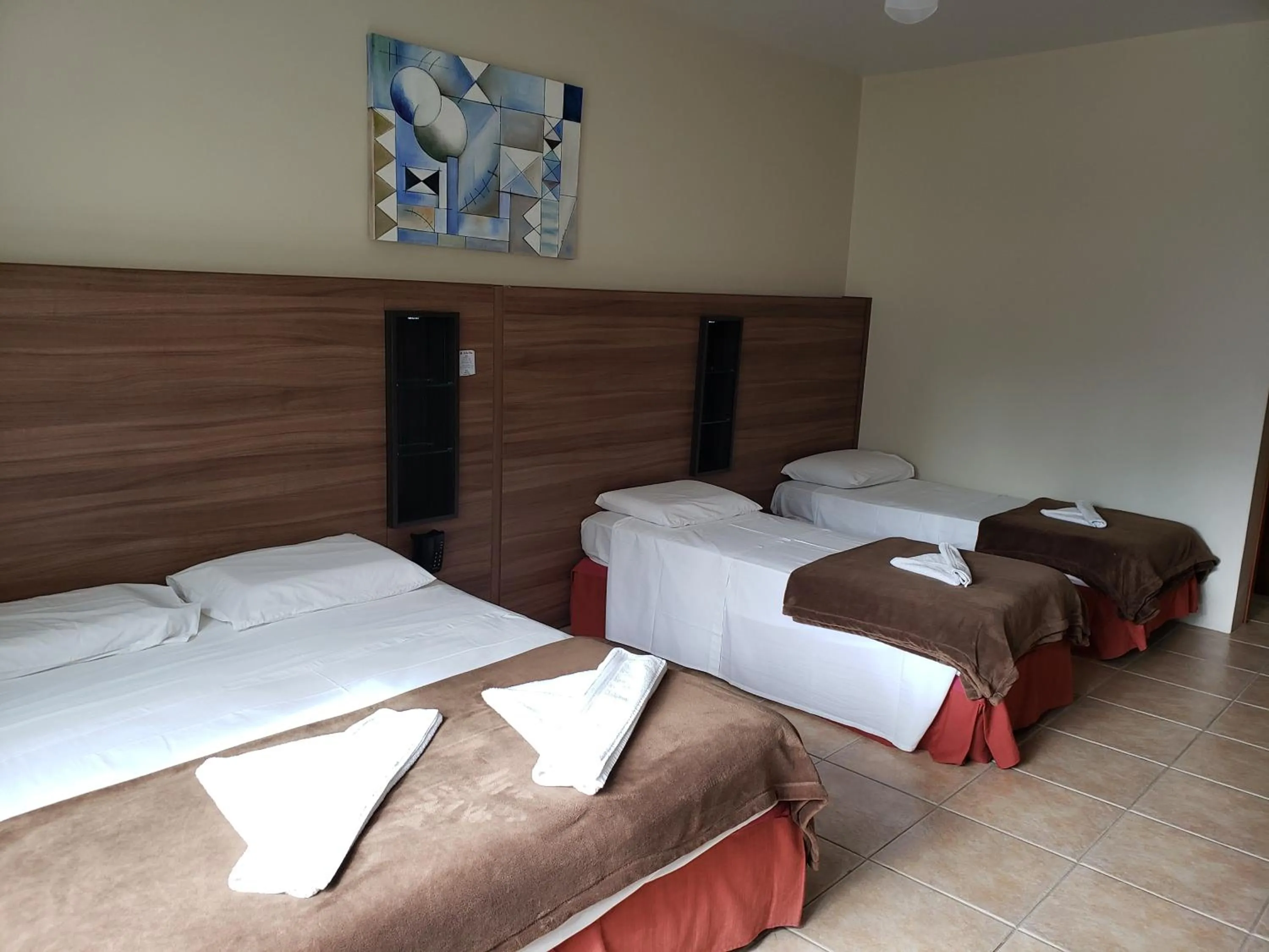 Bed in De Rose Praia Hotel