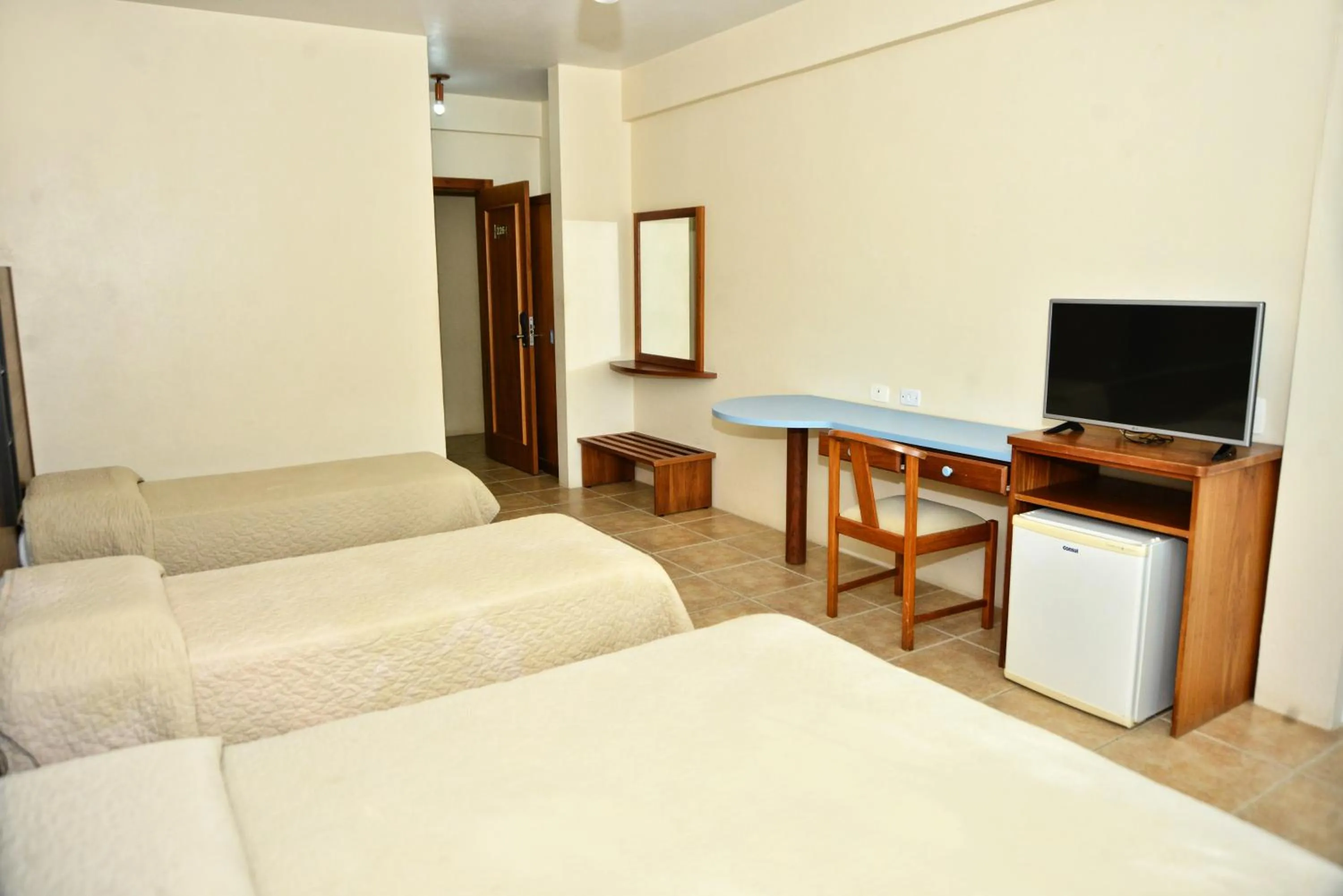 Bed in De Rose Praia Hotel