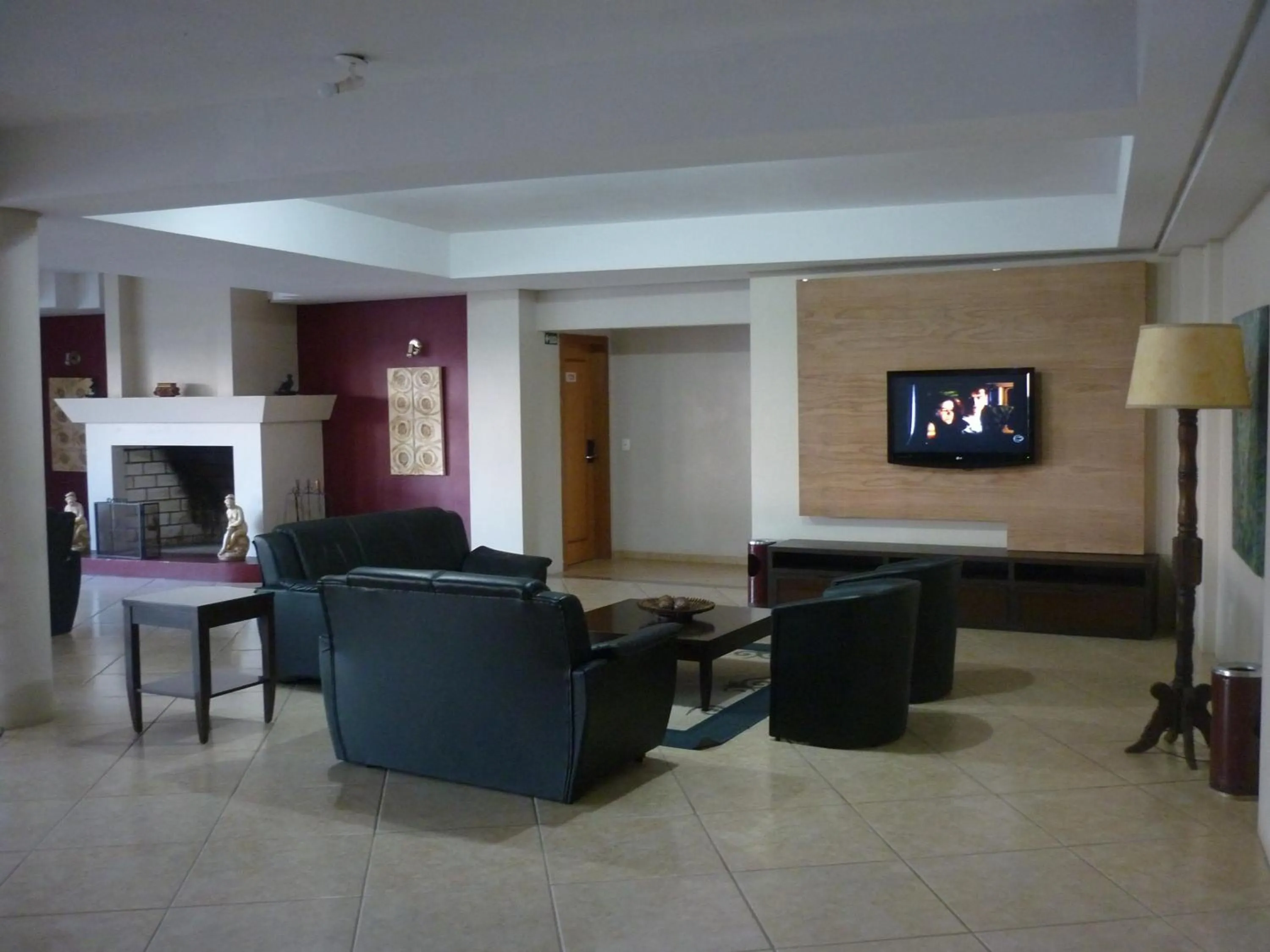 Living room in De Rose Praia Hotel