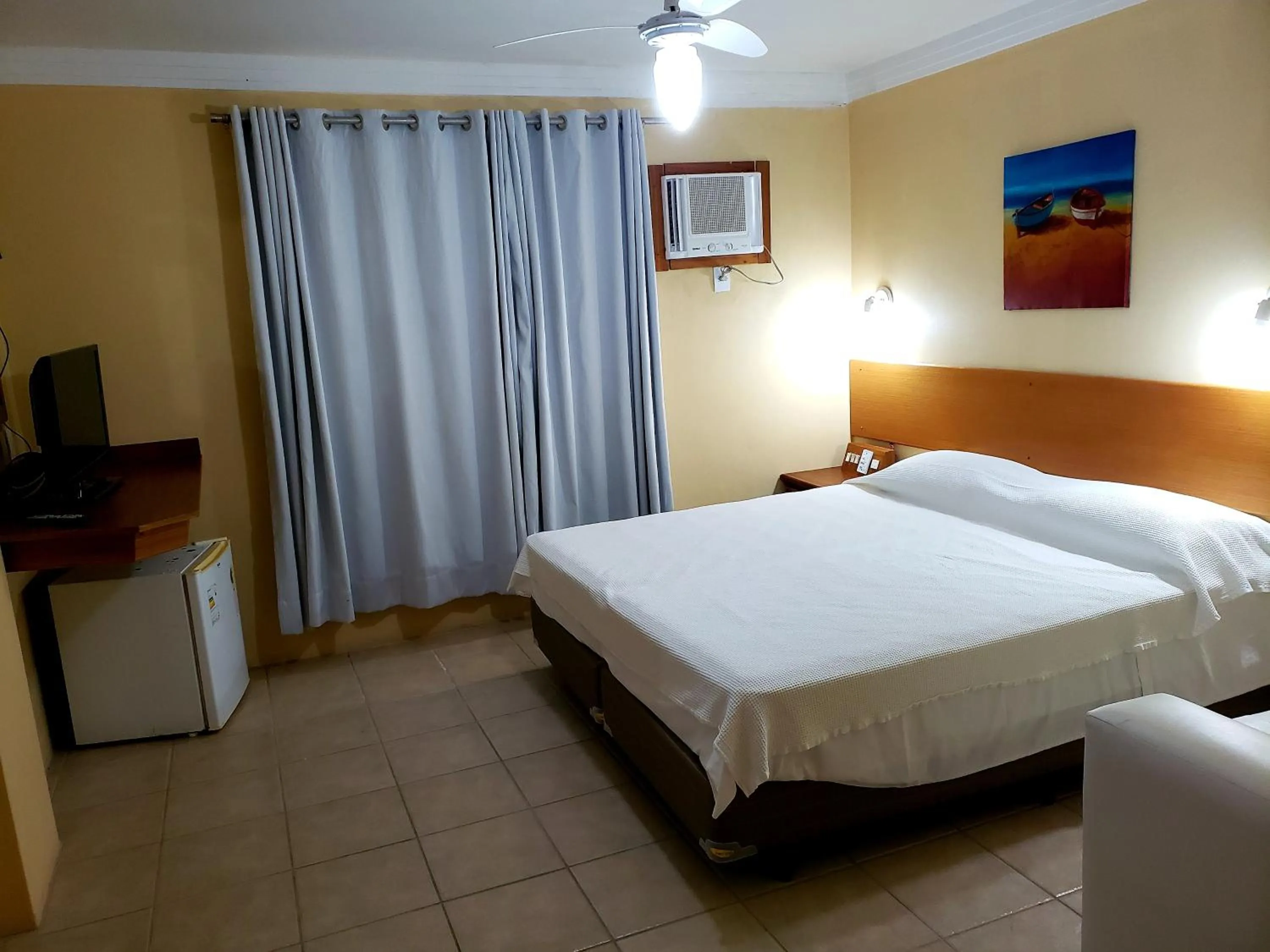 Bed in De Rose Praia Hotel