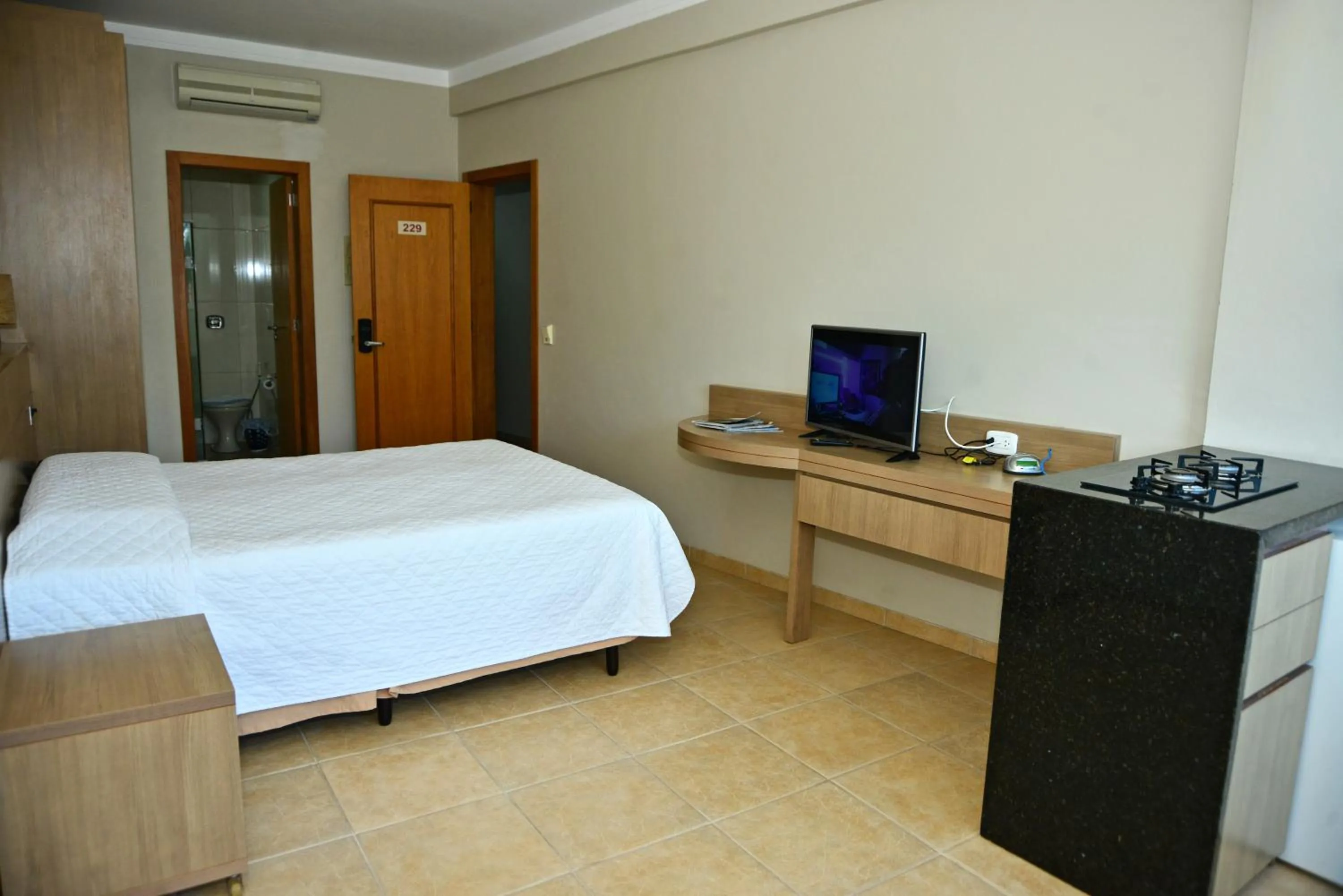 Bed in De Rose Praia Hotel