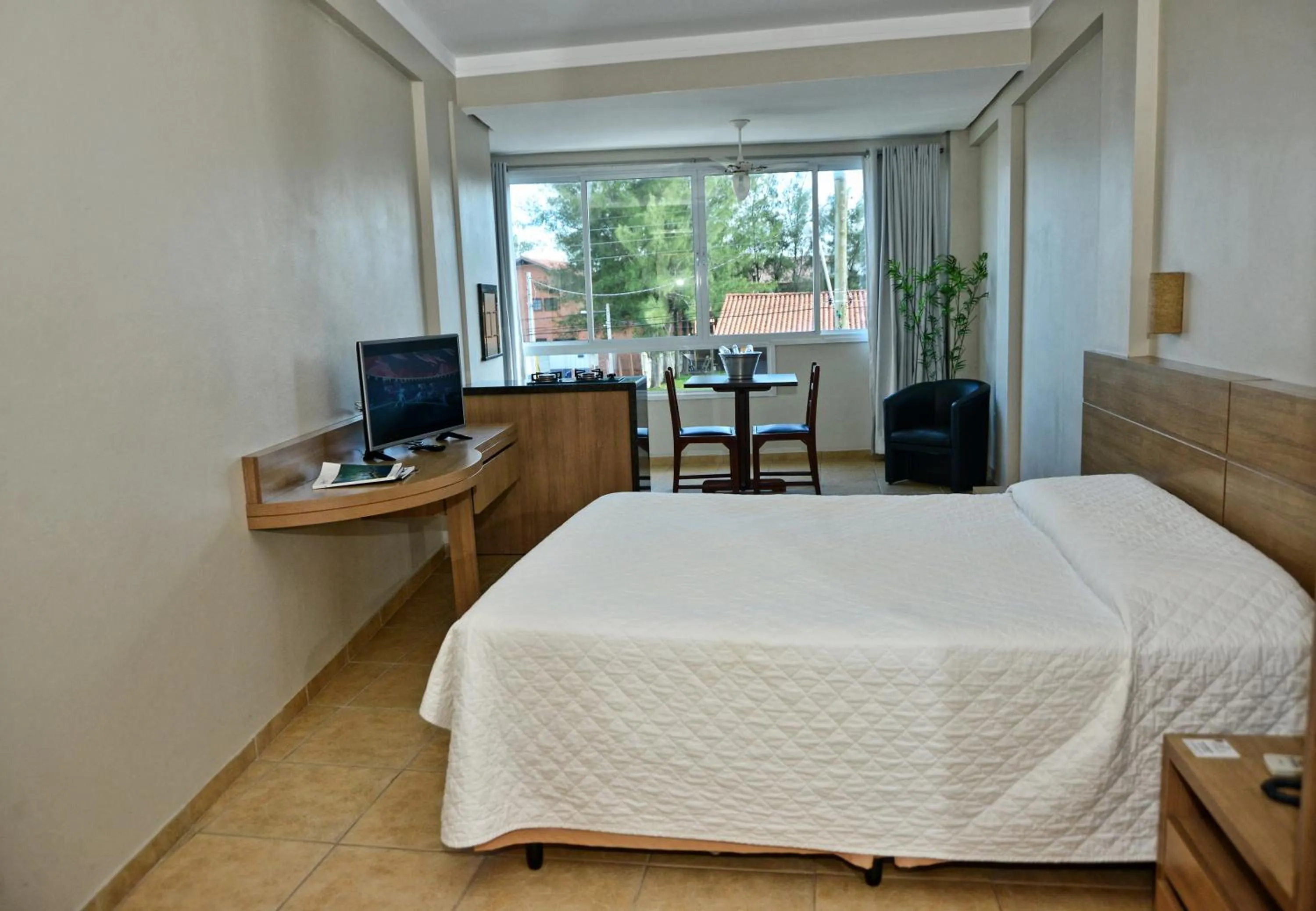 Bed in De Rose Praia Hotel