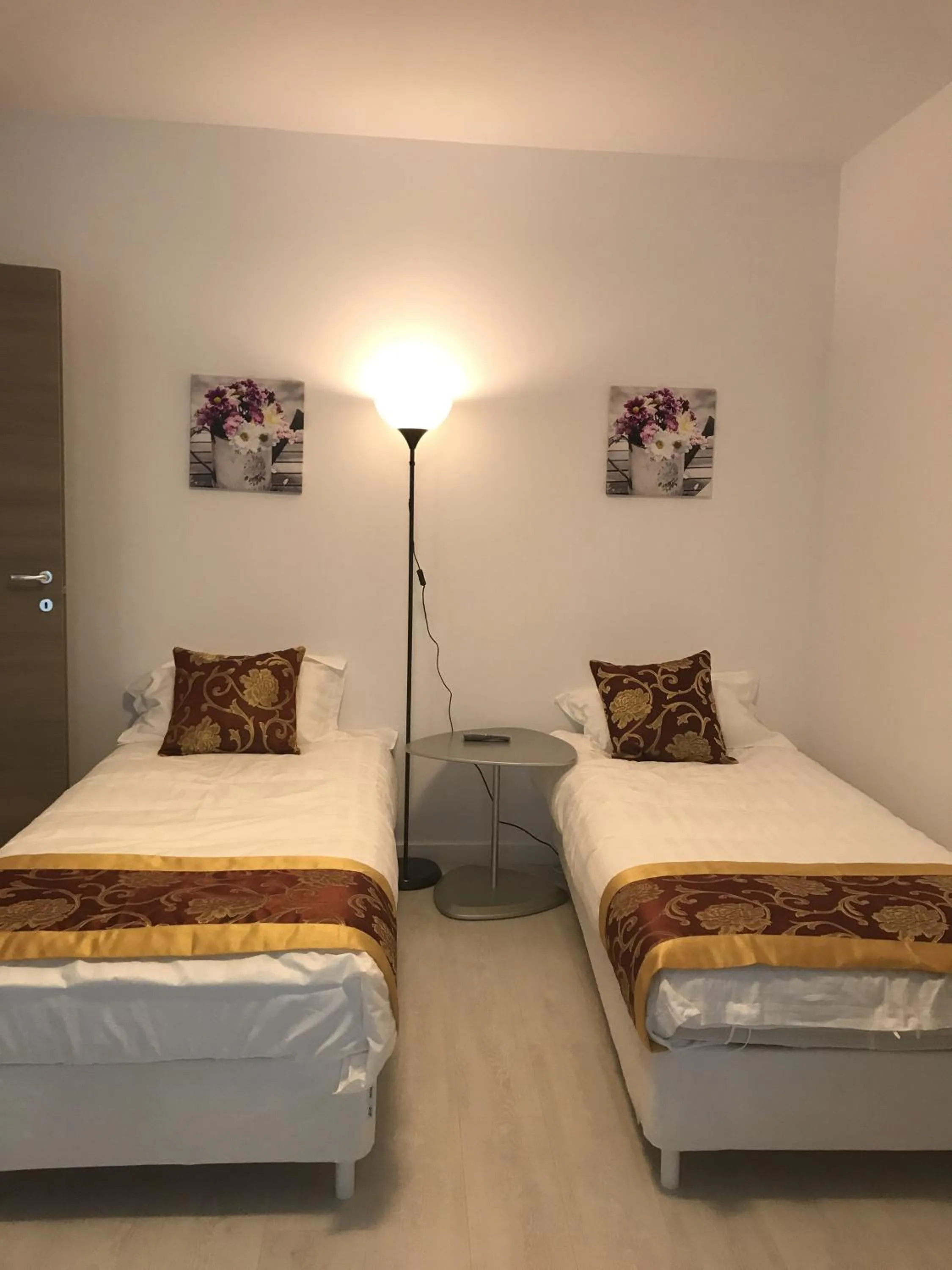 Bed in 21 Residence Apartments