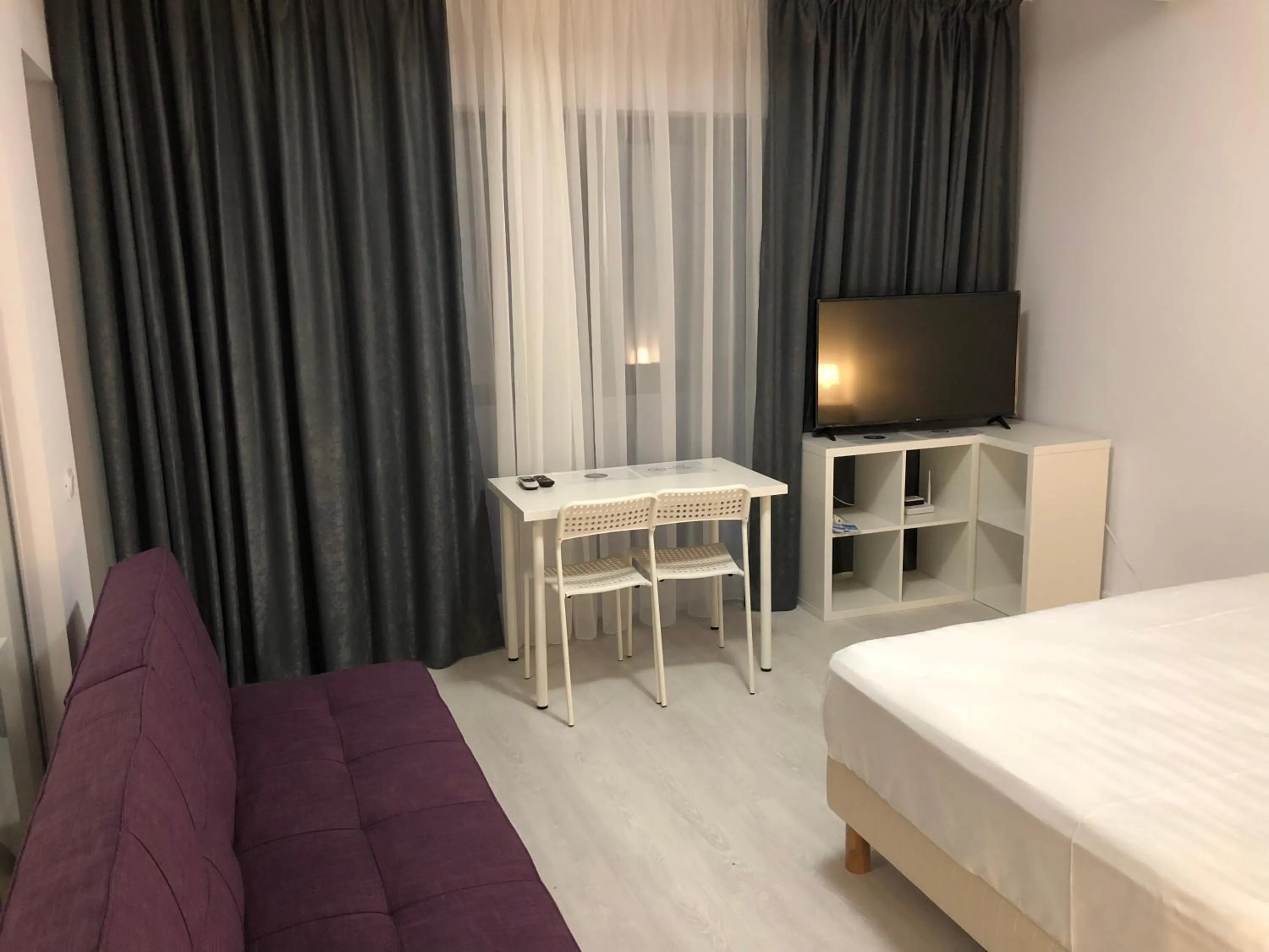 TV and multimedia, Bed in 21 Residence Apartments