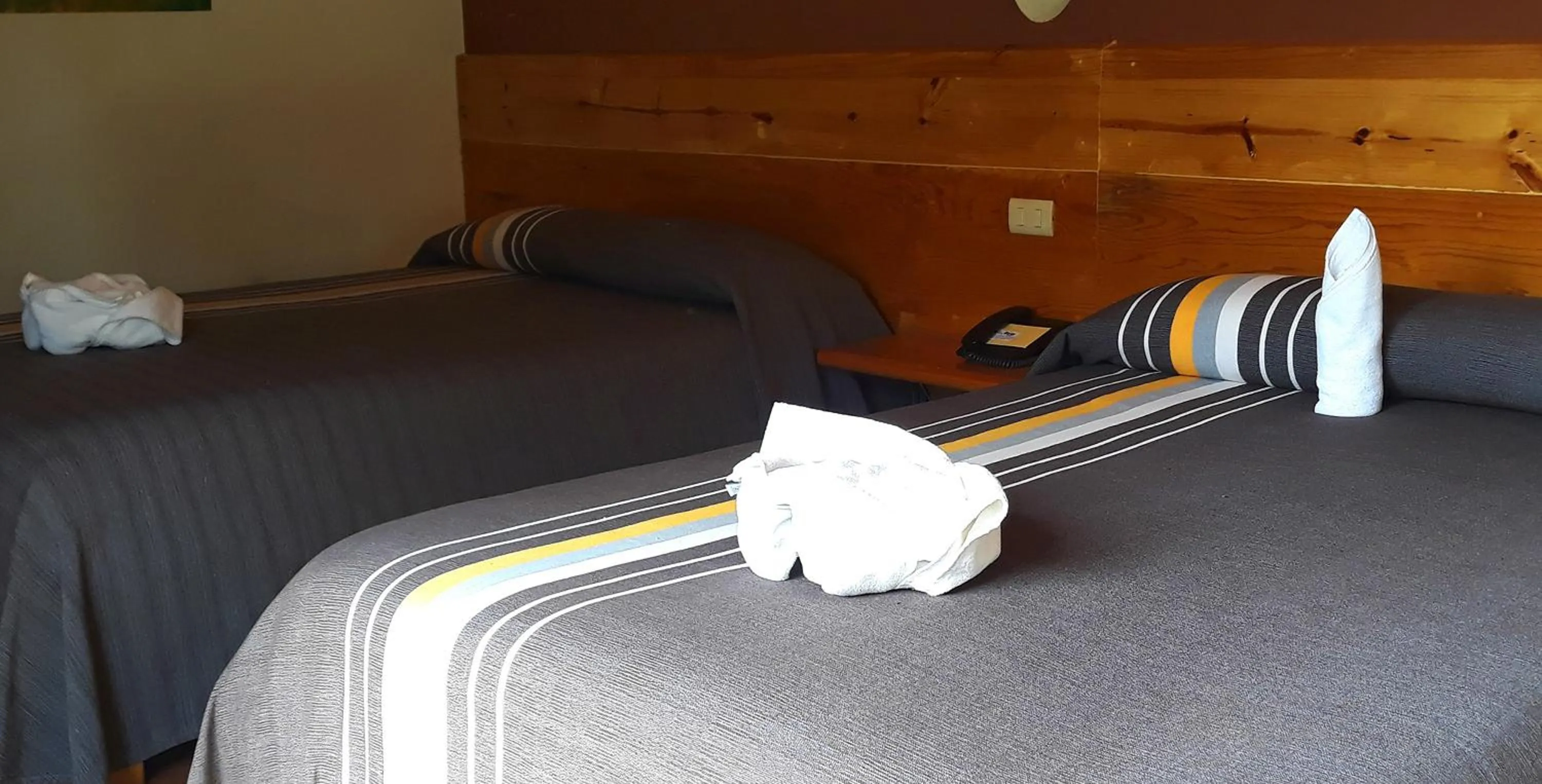 Bed in Axkan Arte Hotel