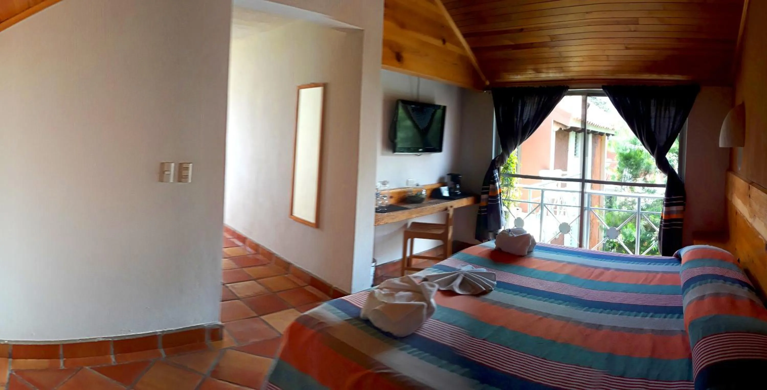 Bed in Axkan Arte Hotel