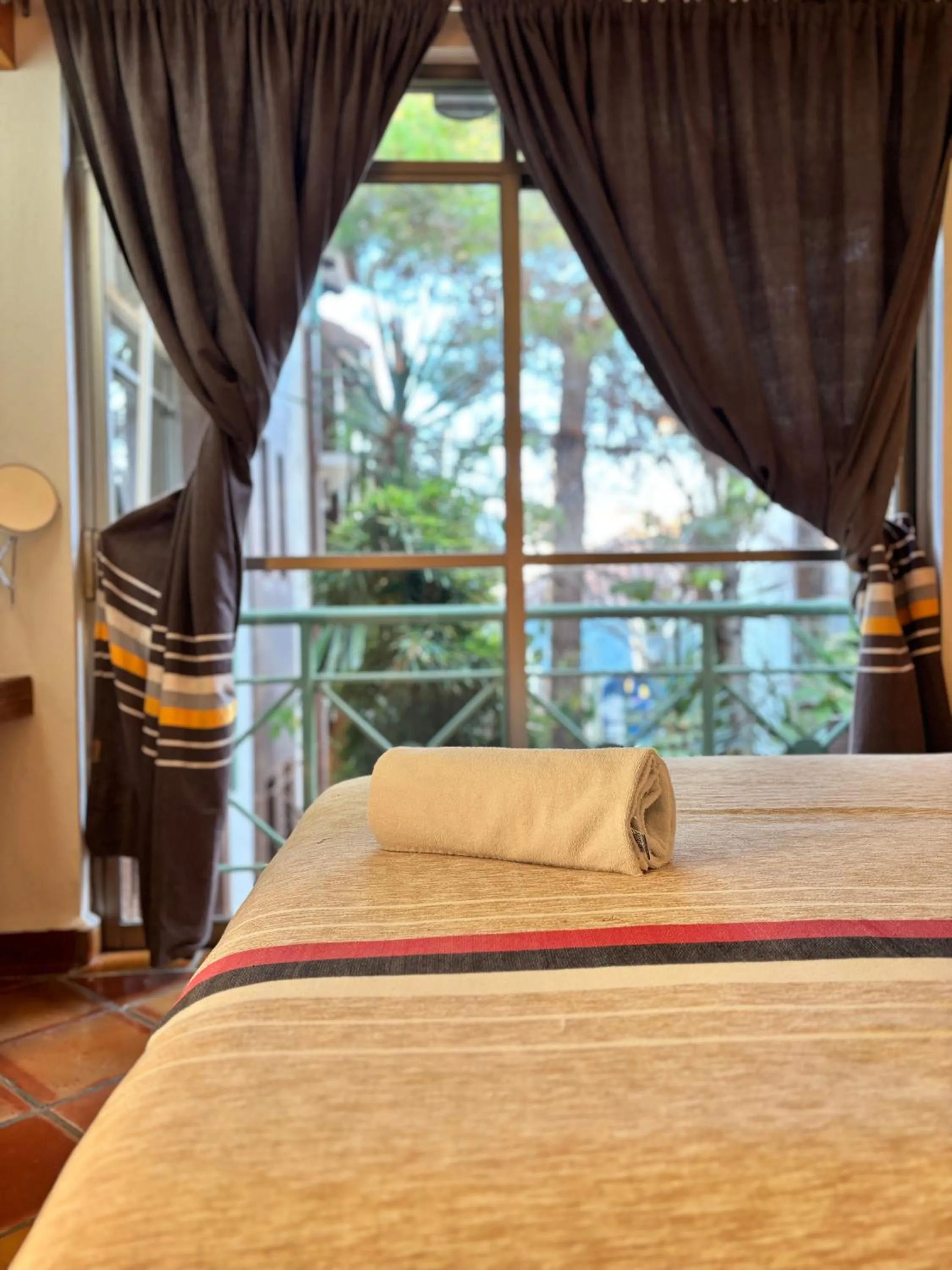 Bed in Axkan Arte Hotel