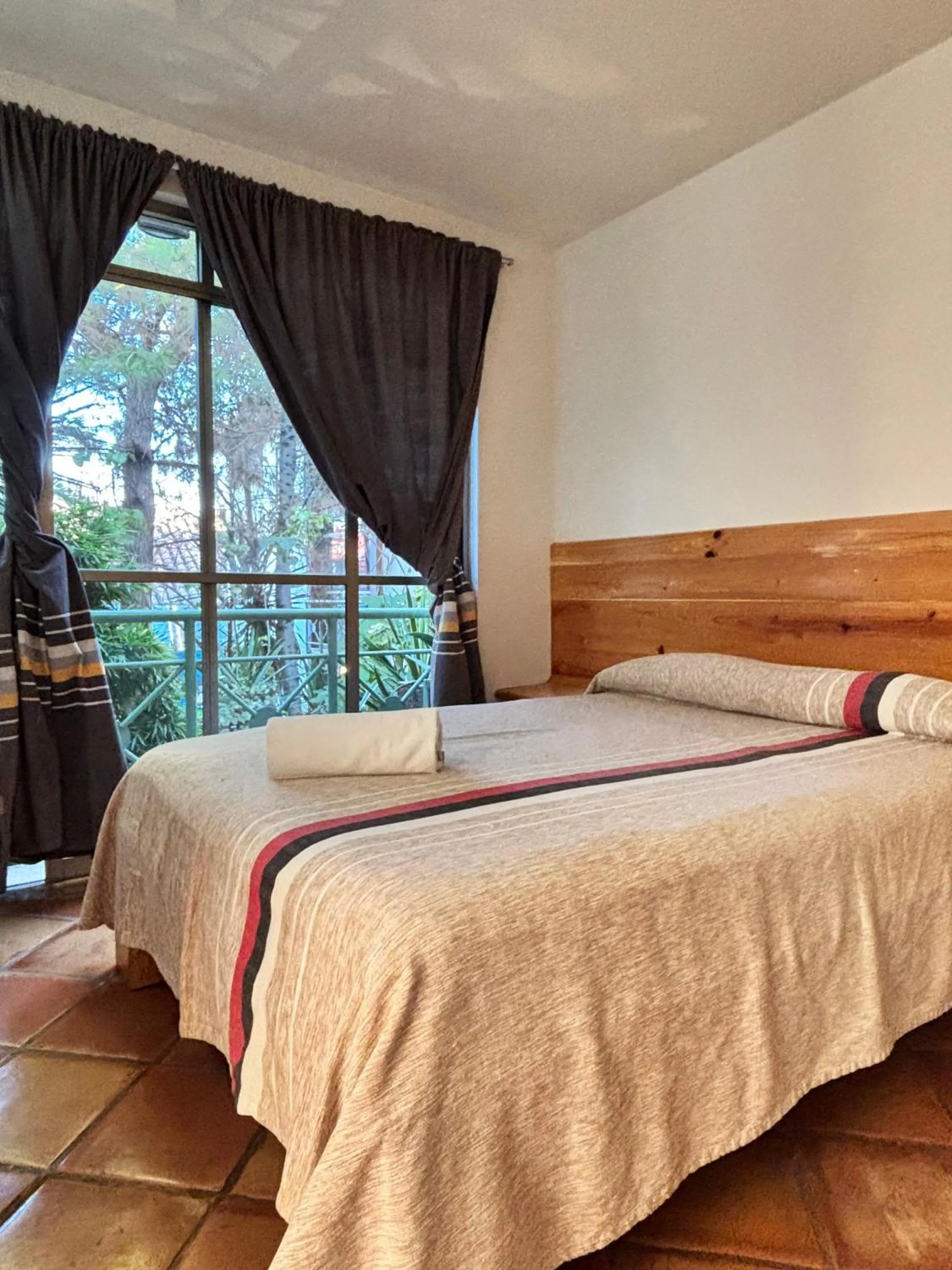 Bed in Axkan Arte Hotel